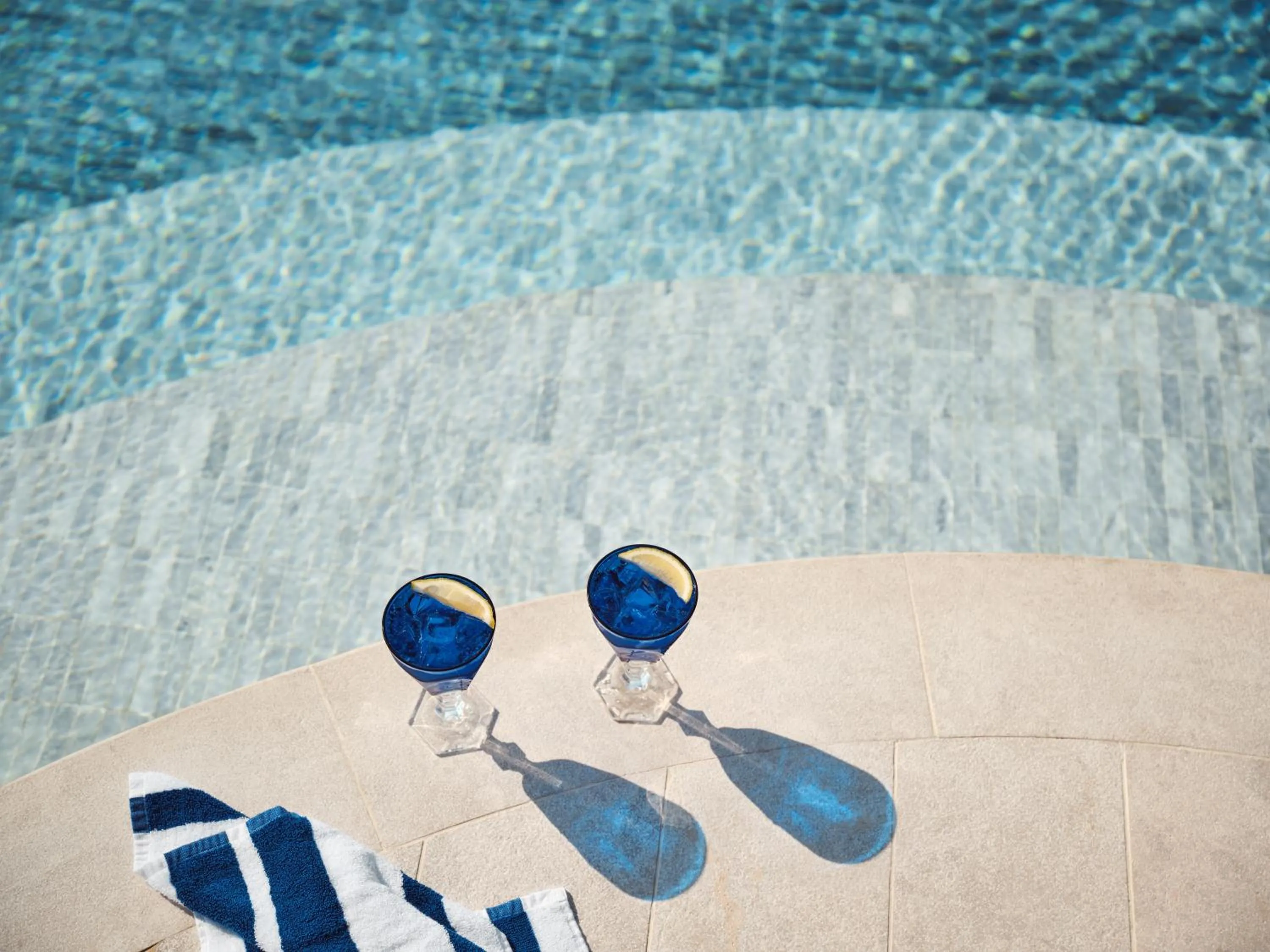 Swimming pool in The Lana - Dorchester Collection