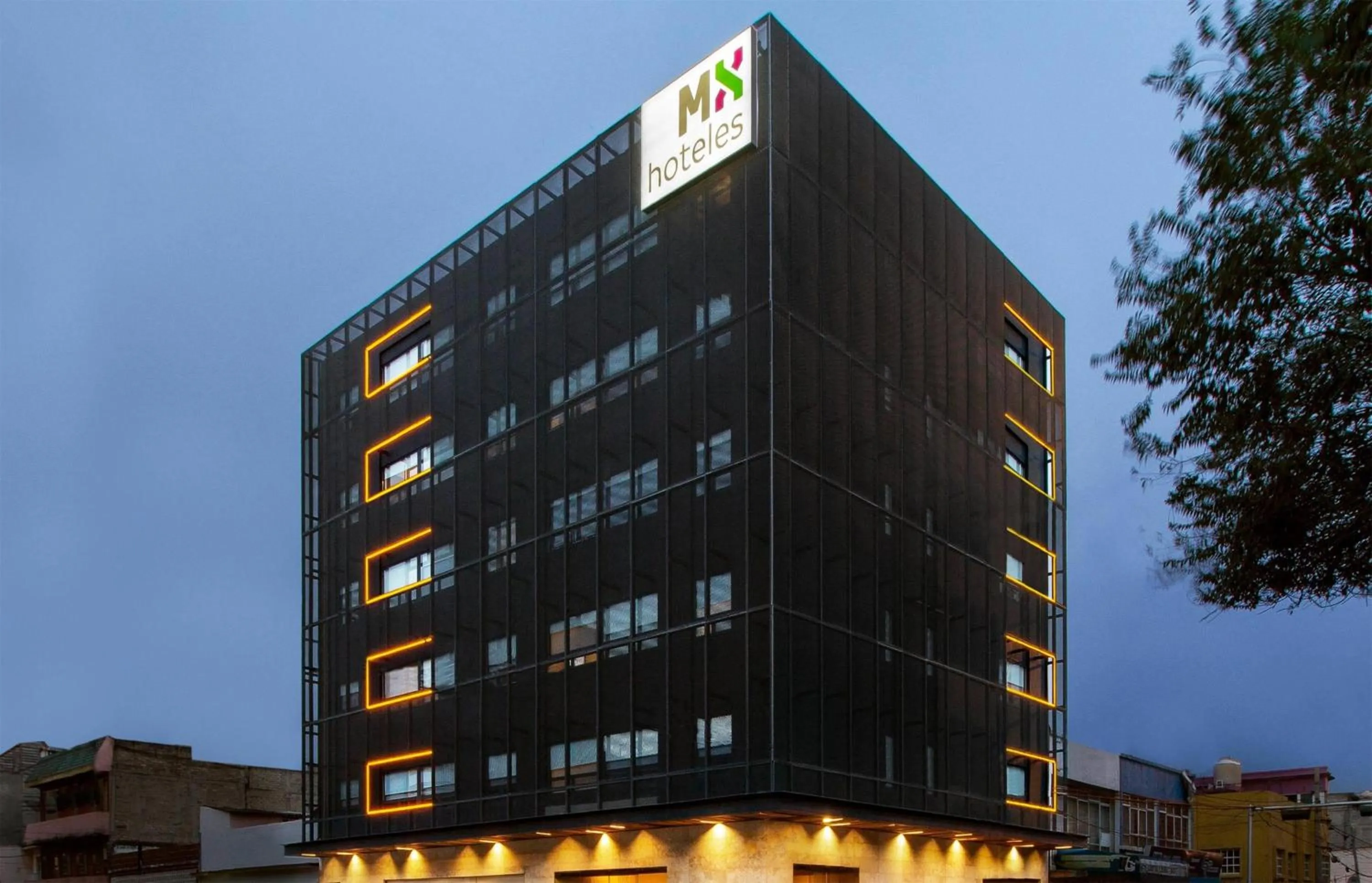 Property building in Hotel MX aeropuerto CDMX, Trademark Collection by Wyndham