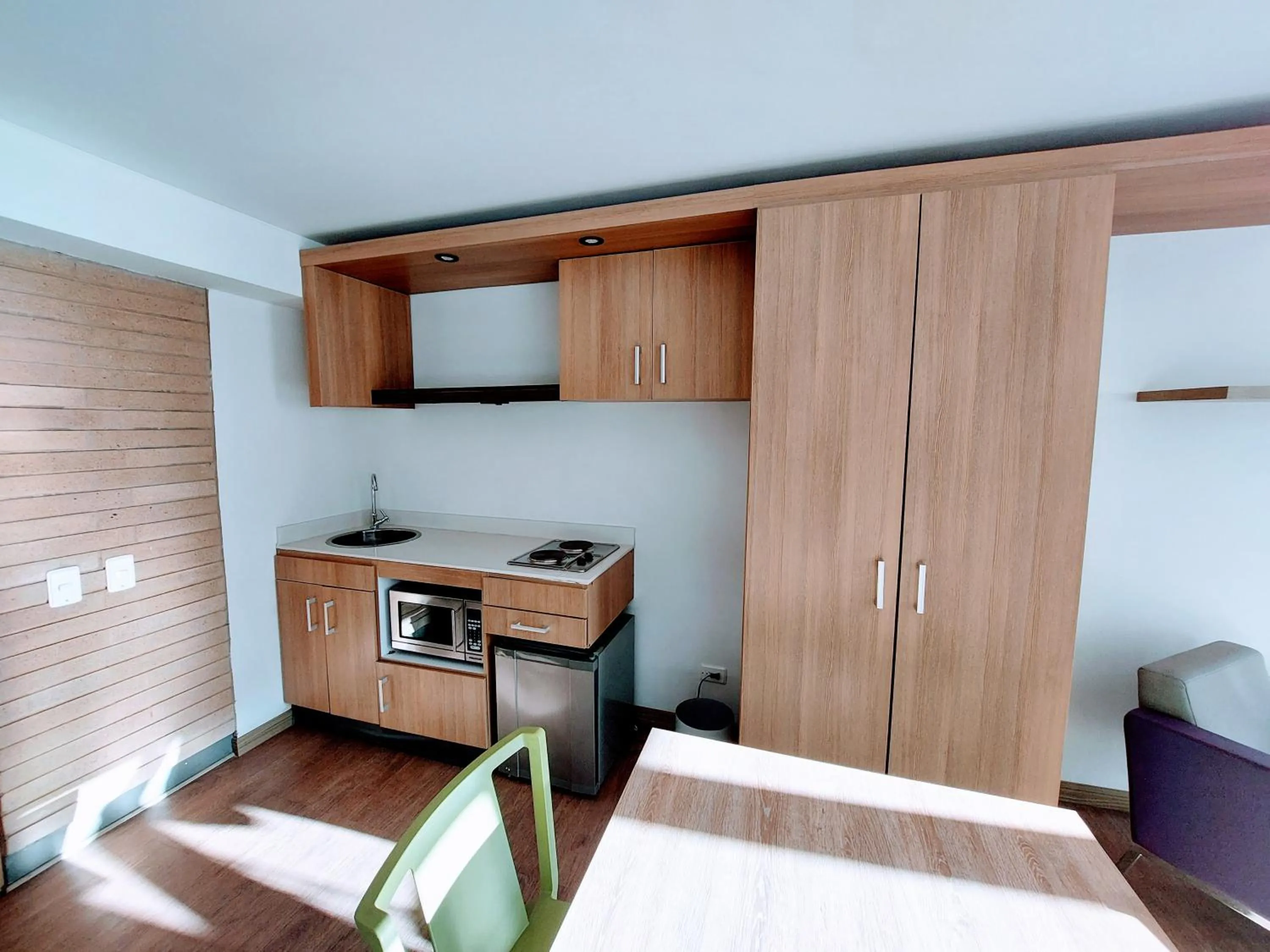 Kitchen or kitchenette in Hotel Viaggio Teleport City Suites