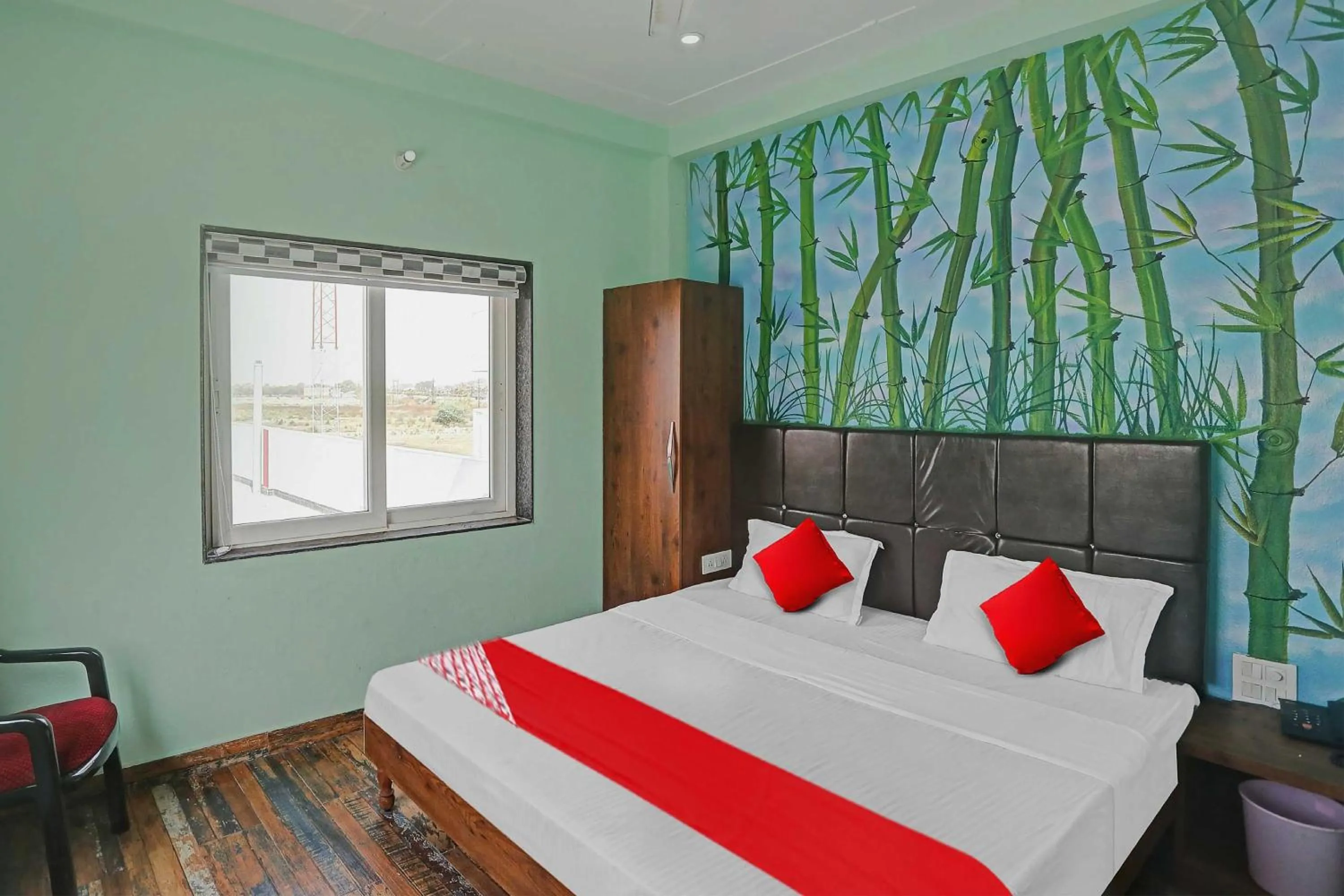 Bedroom in Hotel O MH Inn