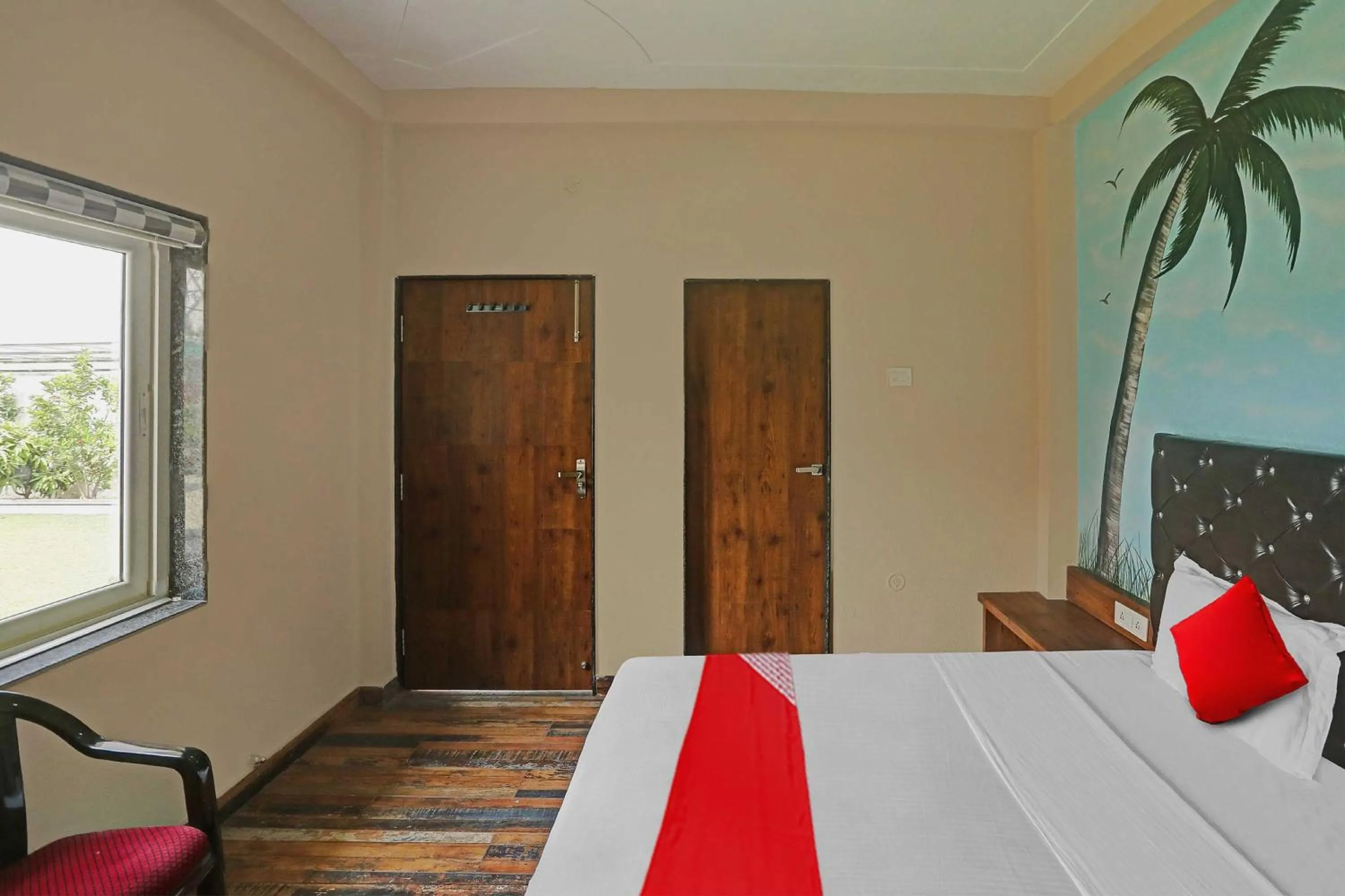 Bedroom in Hotel O MH Inn