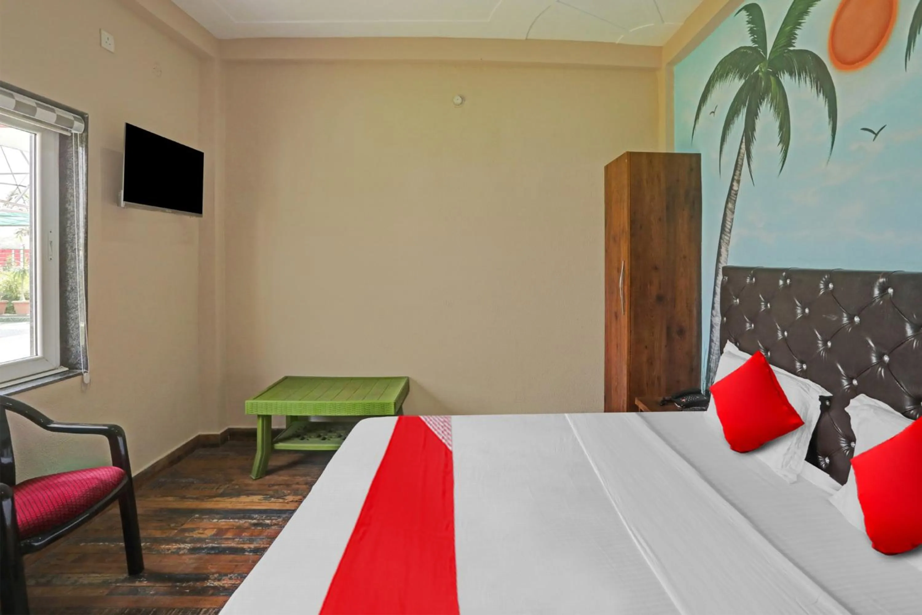 Bedroom in Hotel O MH Inn