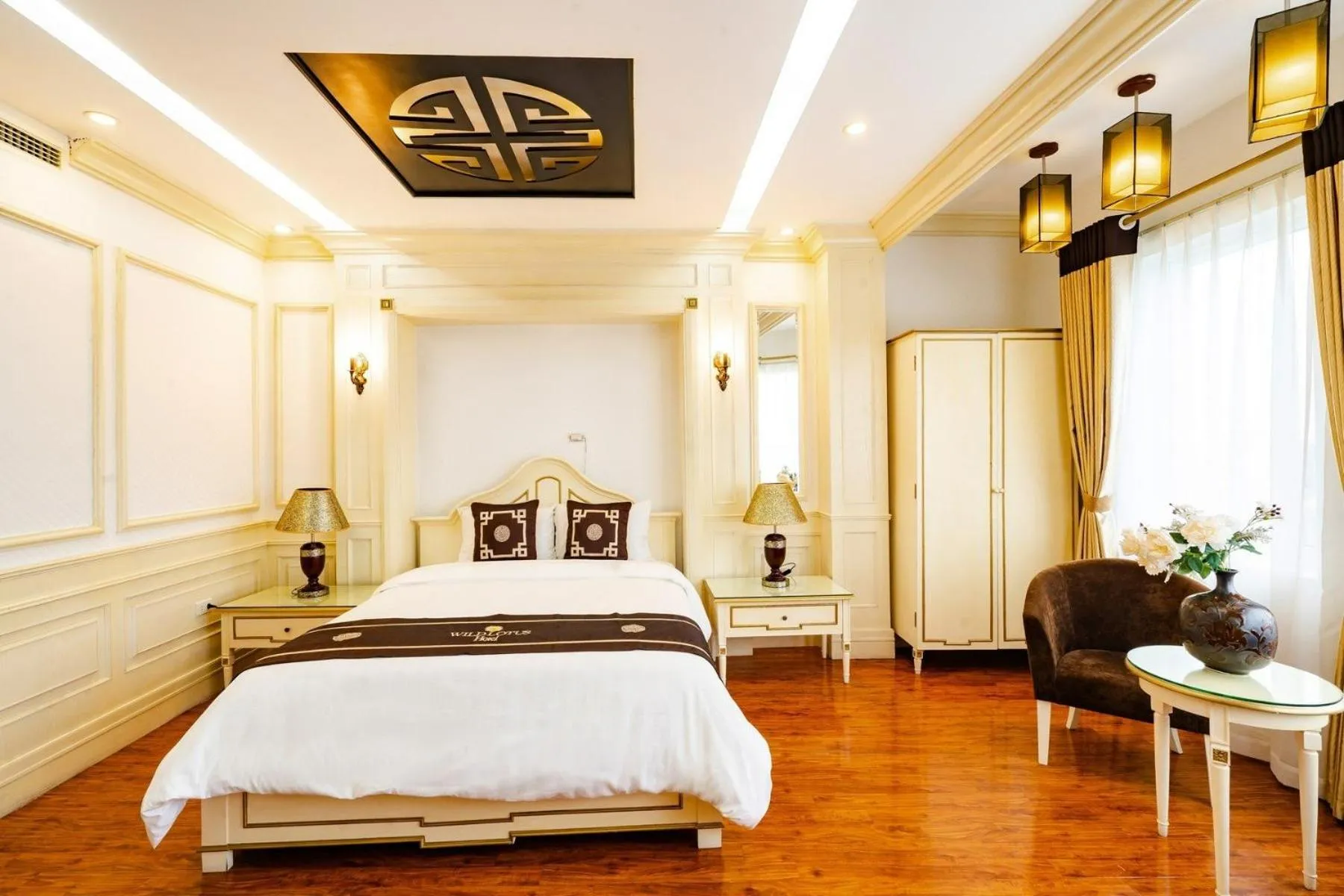 Bed in Wild Lotus Hotel Apartment 2