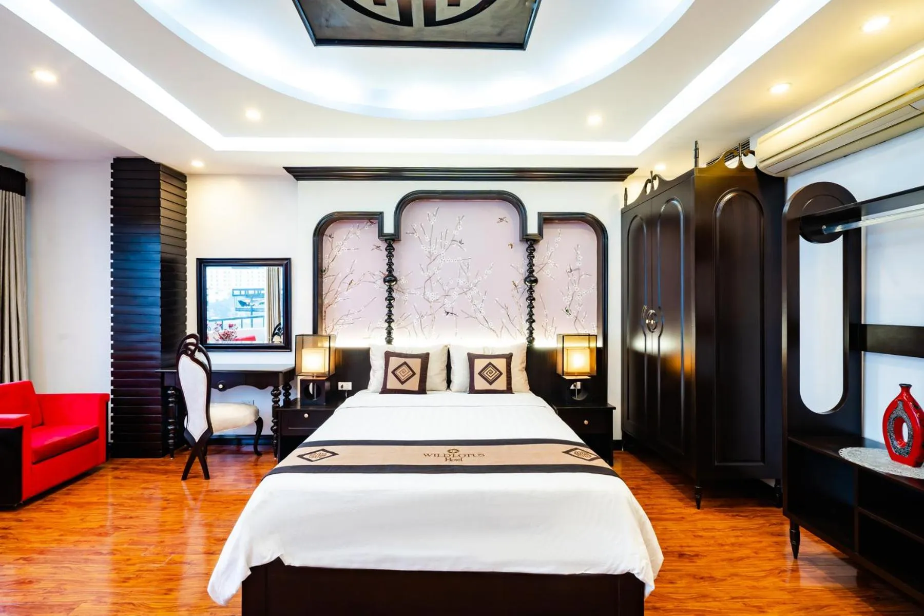 Bed in Wild Lotus Hotel Apartment 2