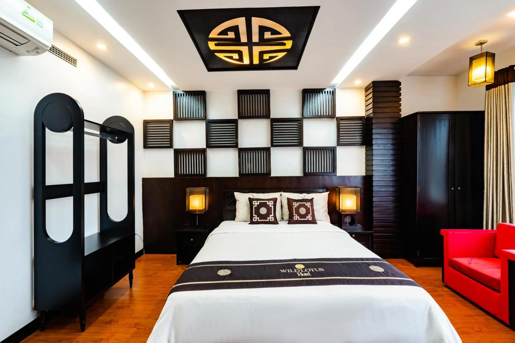 Bedroom, Bed in Wild Lotus Hotel Apartment 2