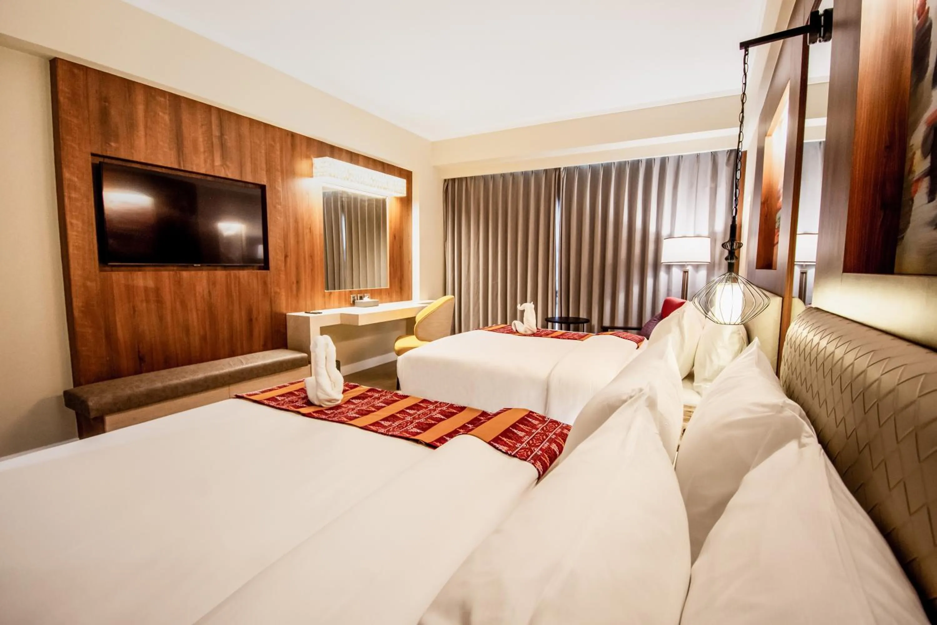 Bed in Mandarin Bay Resort and Spa