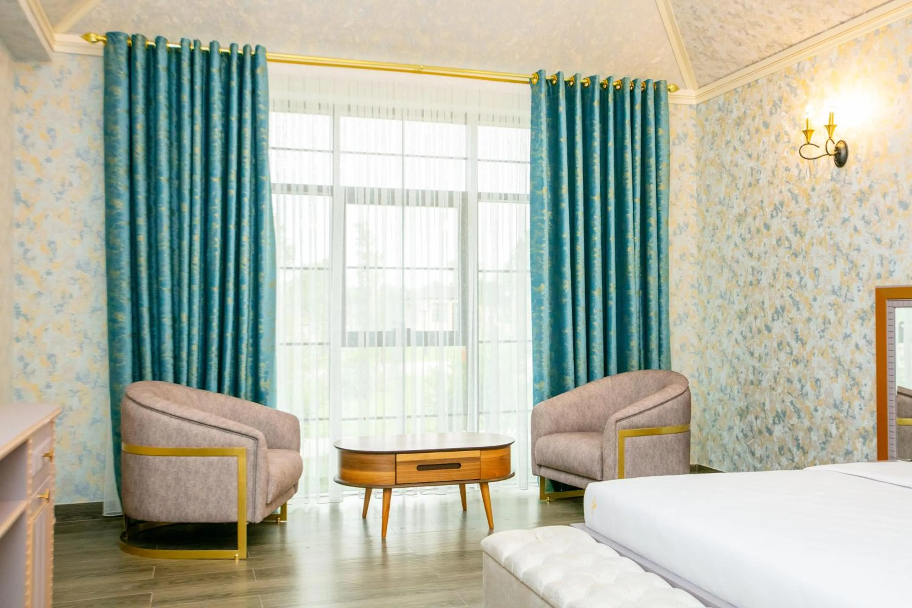 Seating area, Bed in Nohur Hotel Gabala