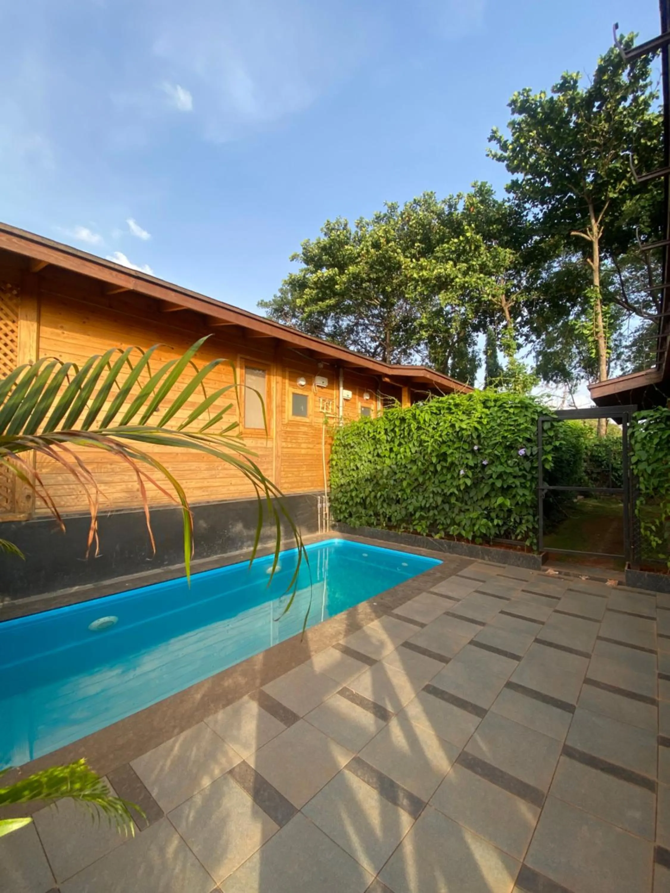 Swimming pool in Villament Zinc Journey By The Fern, Karjat