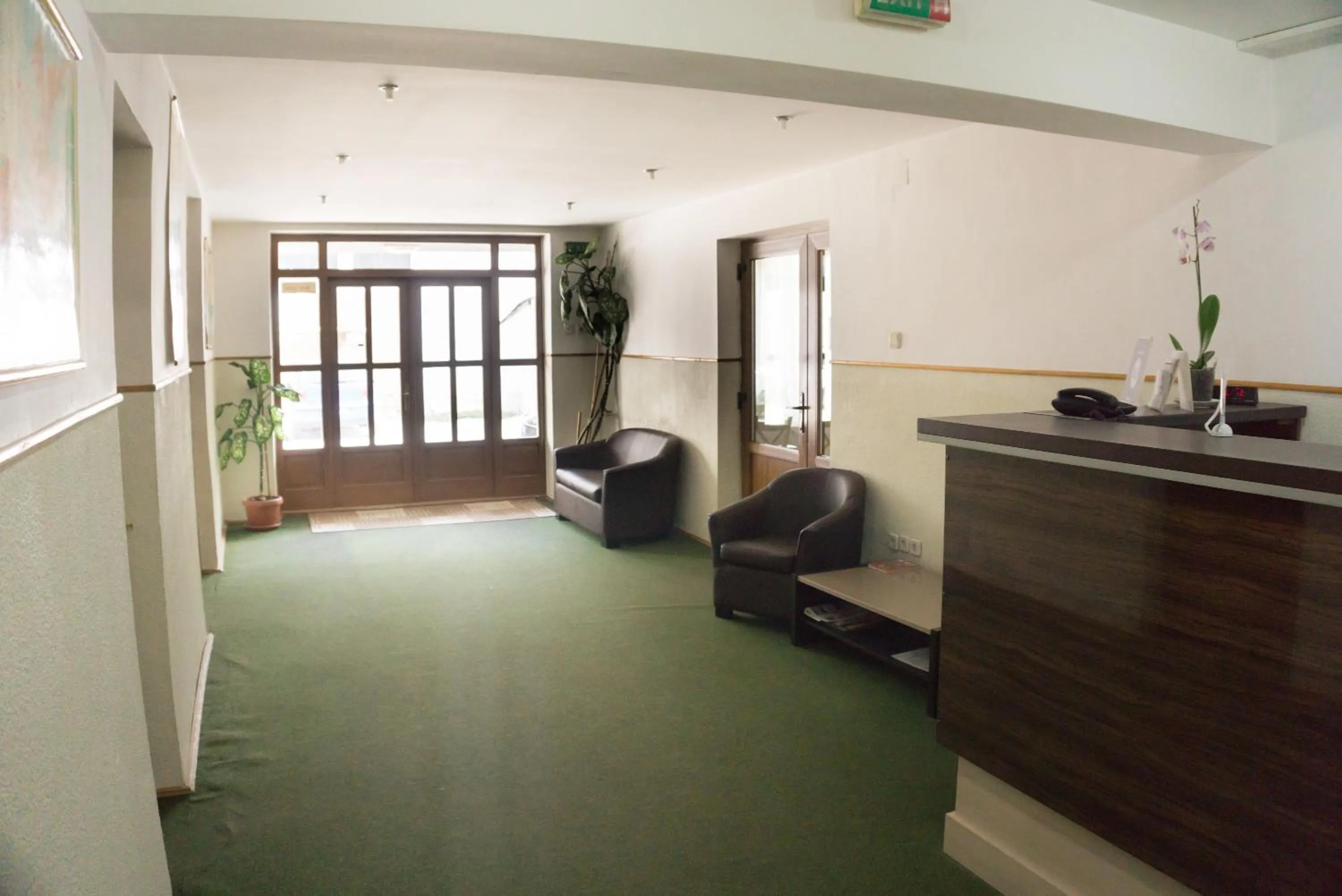 Lobby or reception in Hotel Merkur