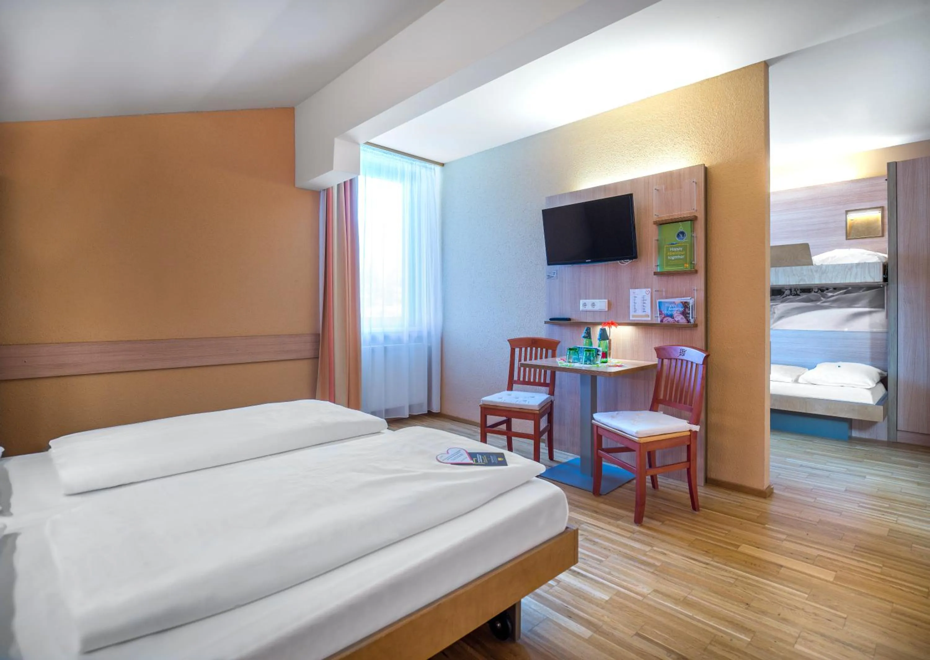 Photo of the whole room, Bed in JUFA Hotel Altenmarkt-Zauchensee