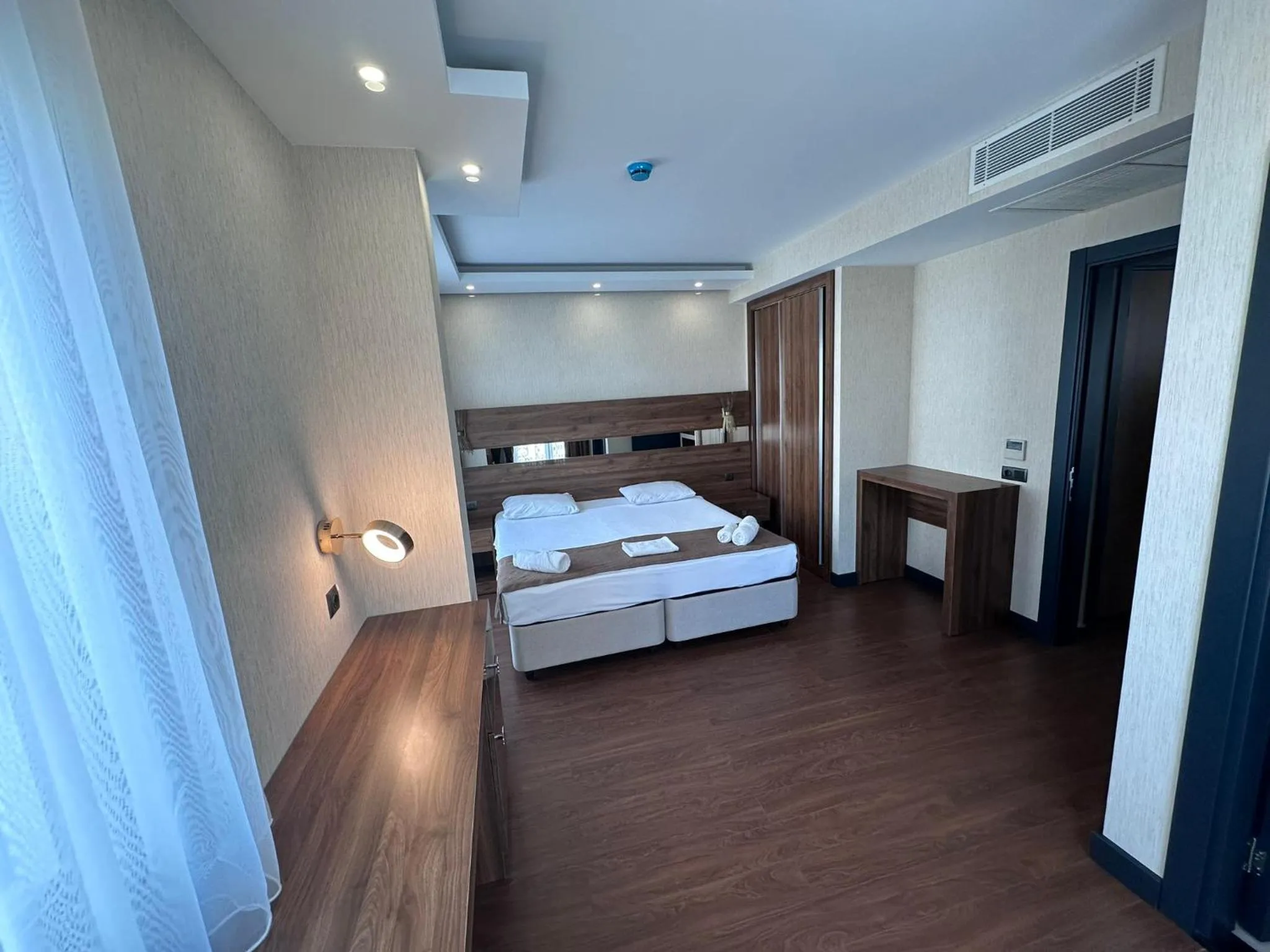 Bed in STAR SUIT HOTEL