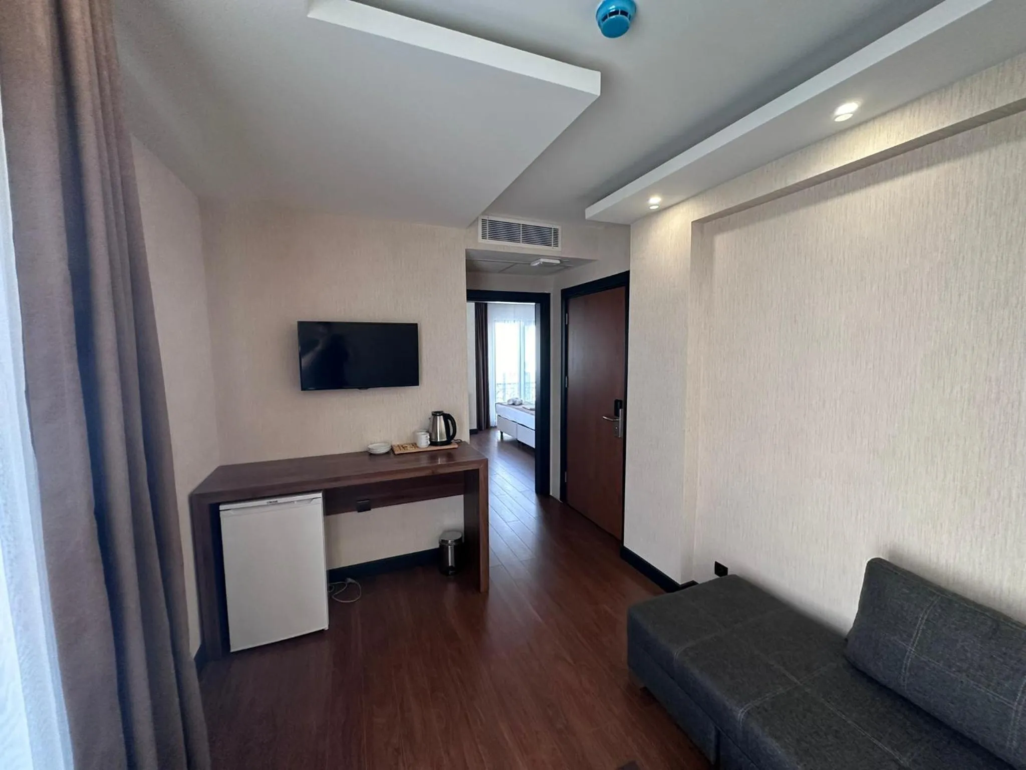 Communal lounge/ TV room in STAR SUIT HOTEL