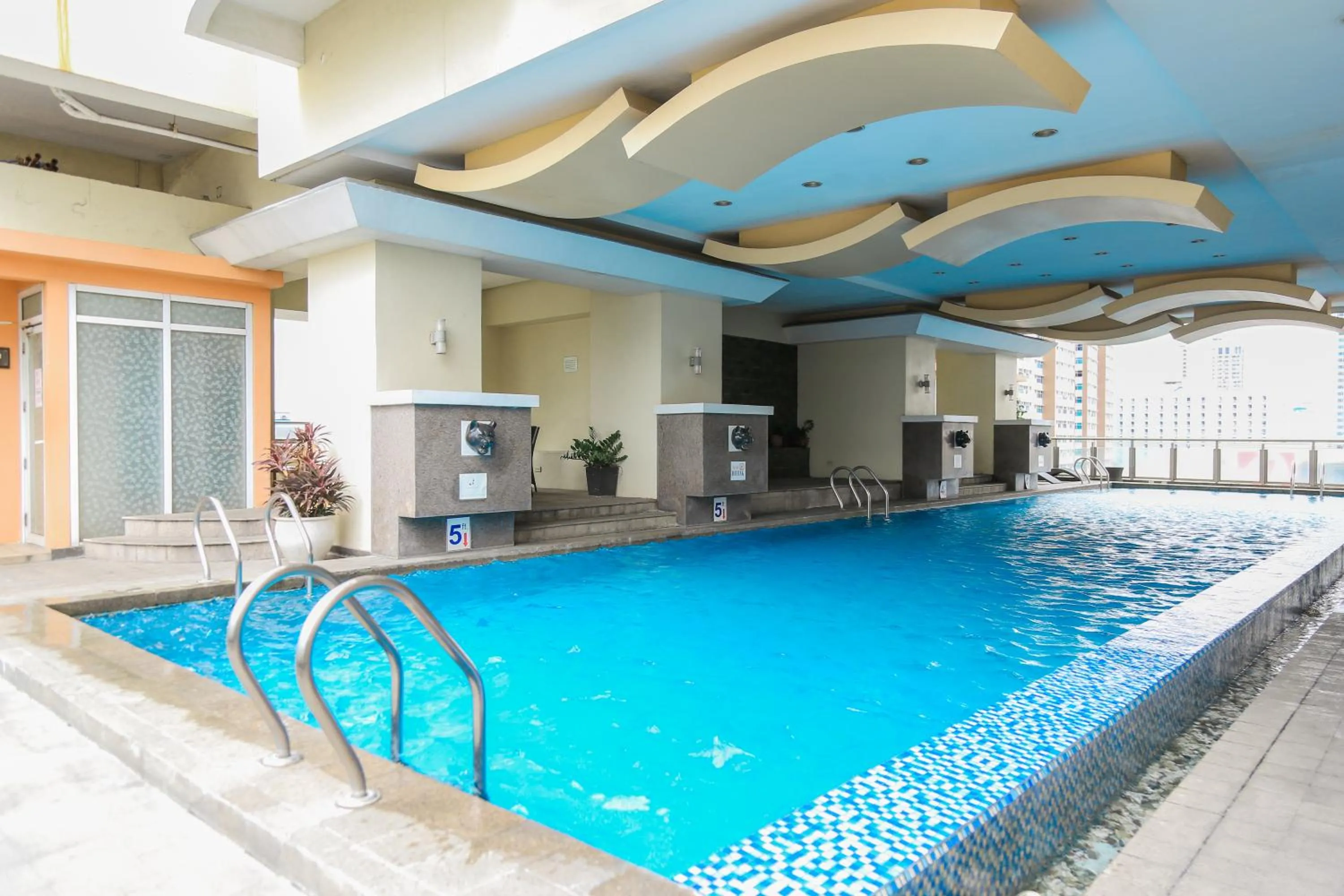 Swimming pool in Pacific Bay Grand Suites