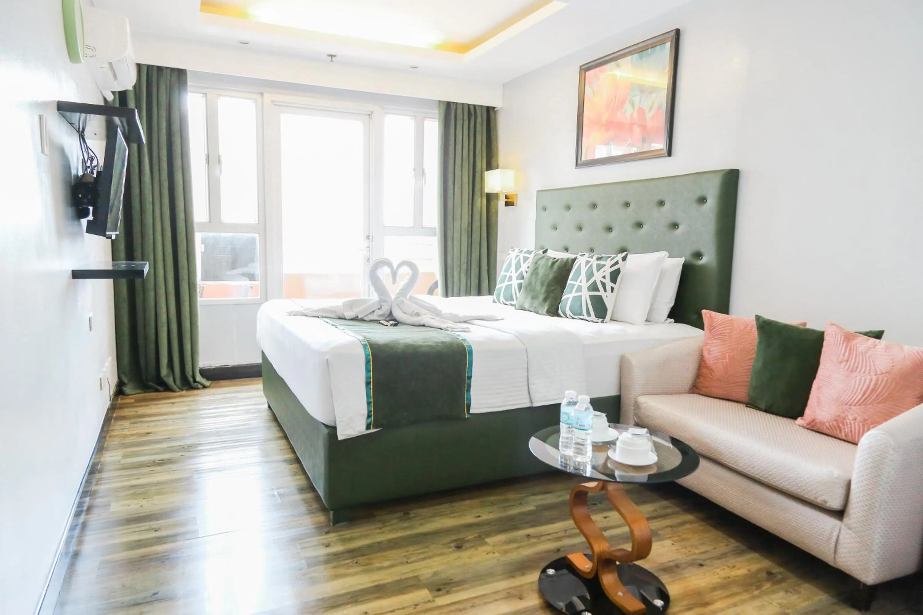 Photo of the whole room, Bed in Pacific Bay Grand Suites