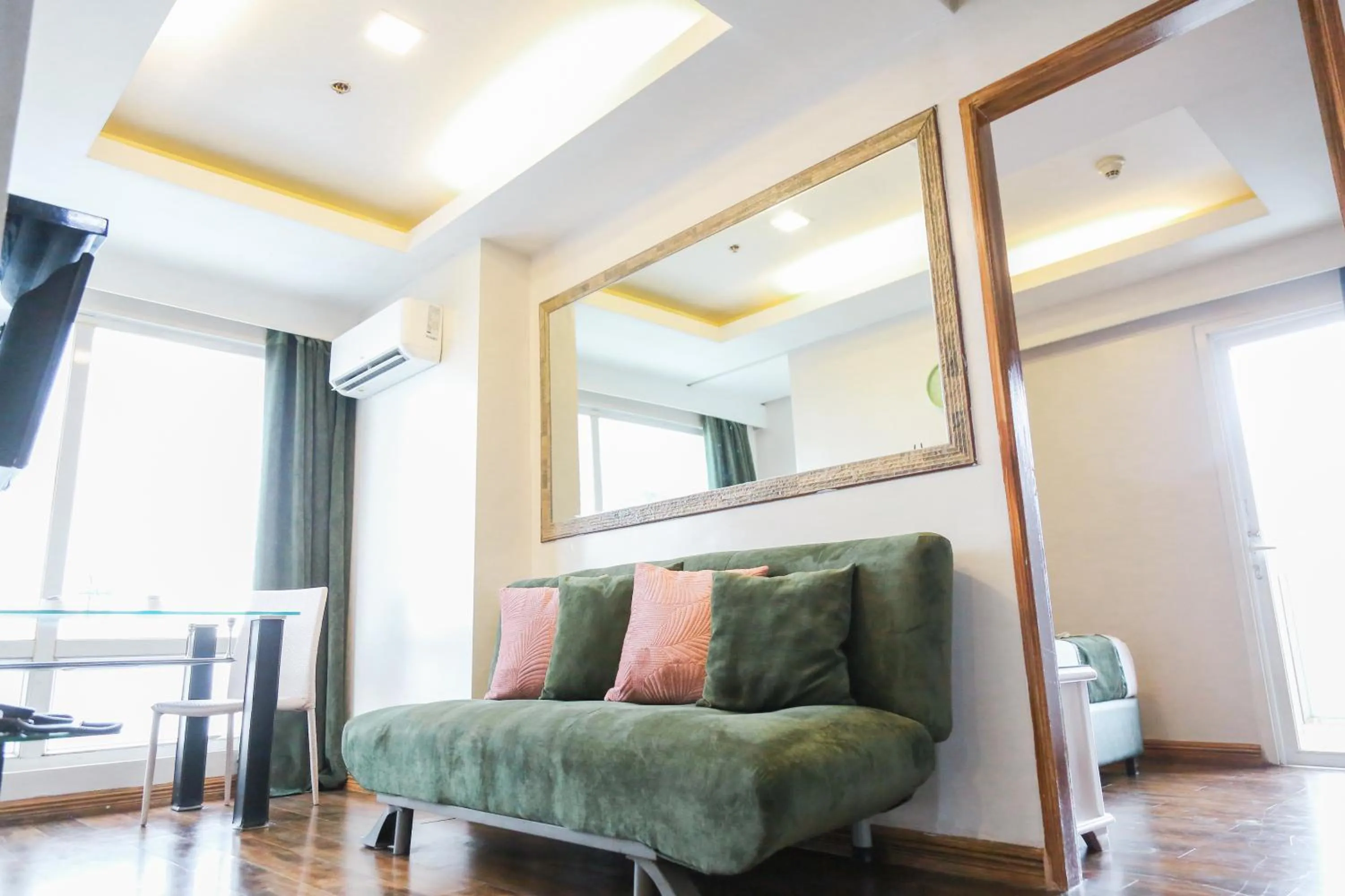 Living room in Pacific Bay Grand Suites