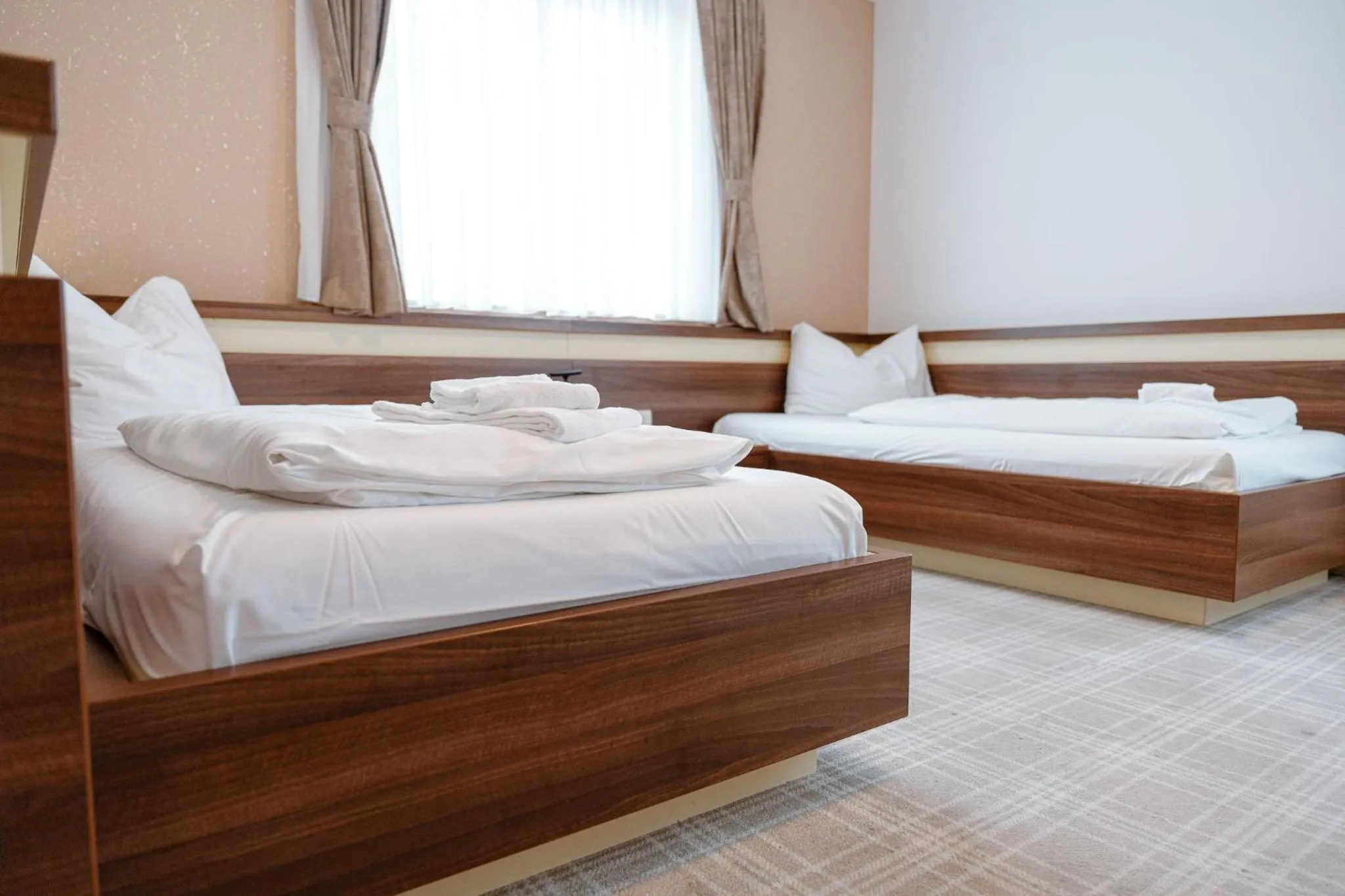 Bed in Primus Hotel & Apartments