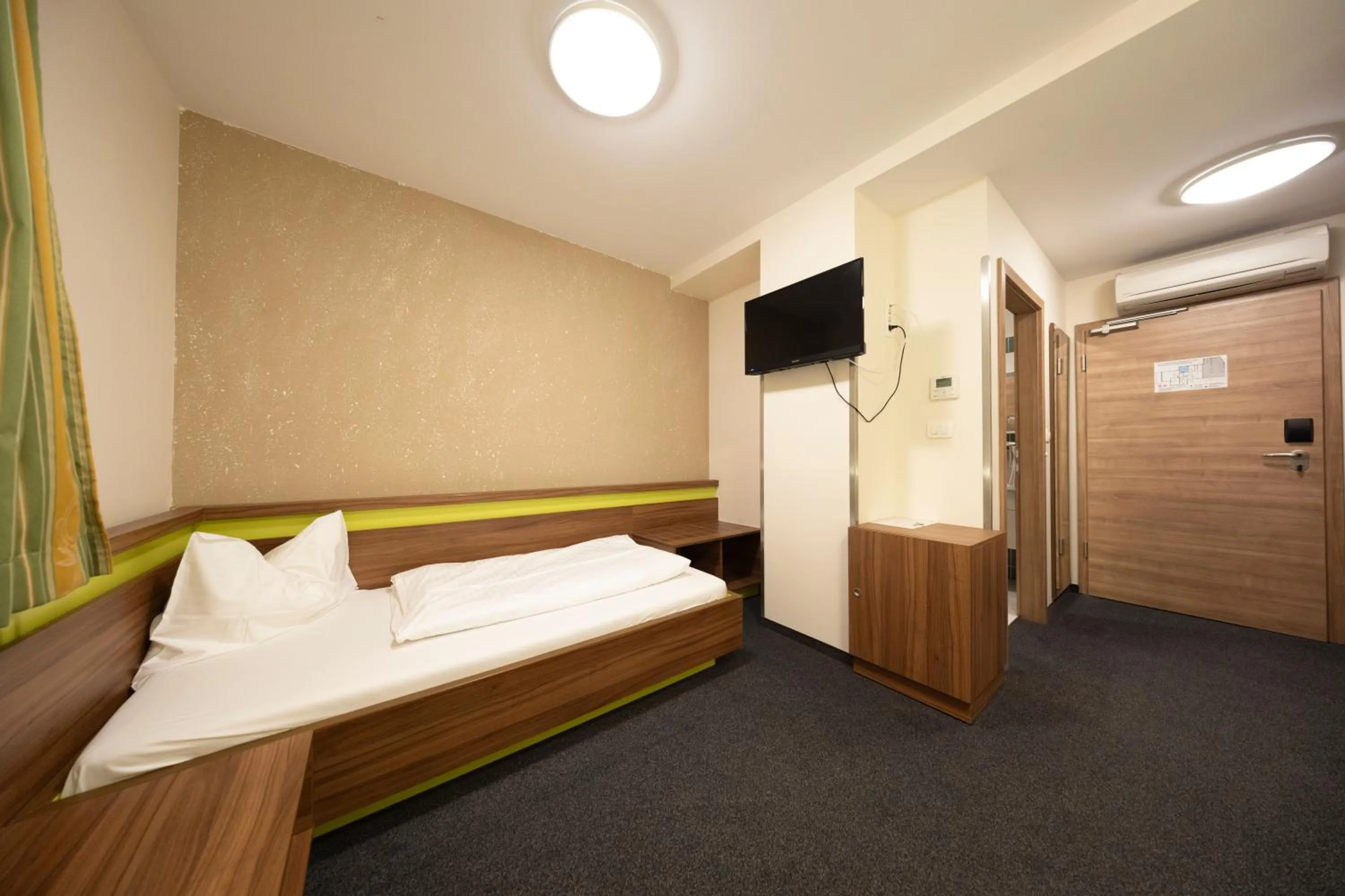 Bed in Primus Hotel & Apartments