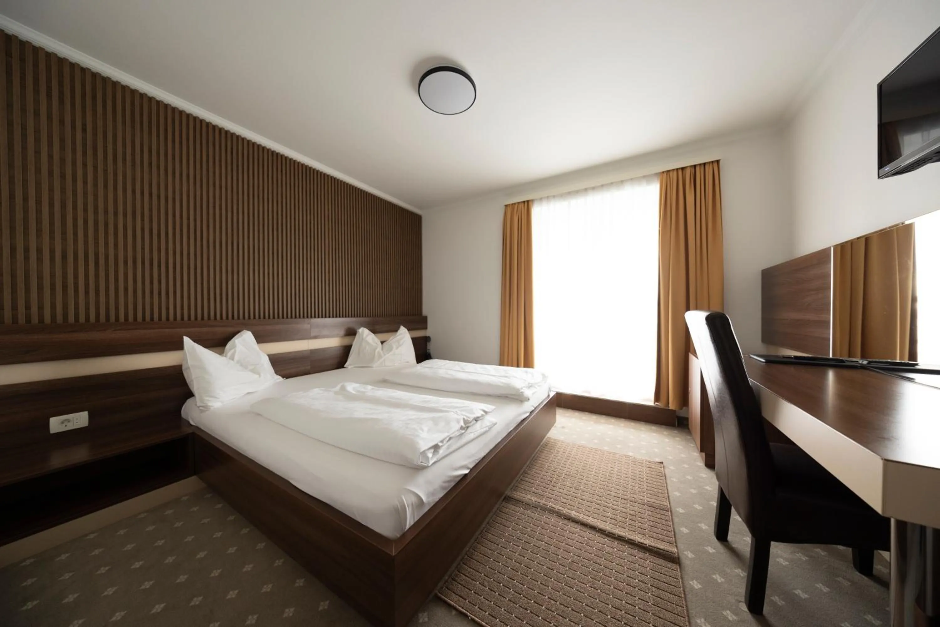 Bed in Primus Hotel & Apartments