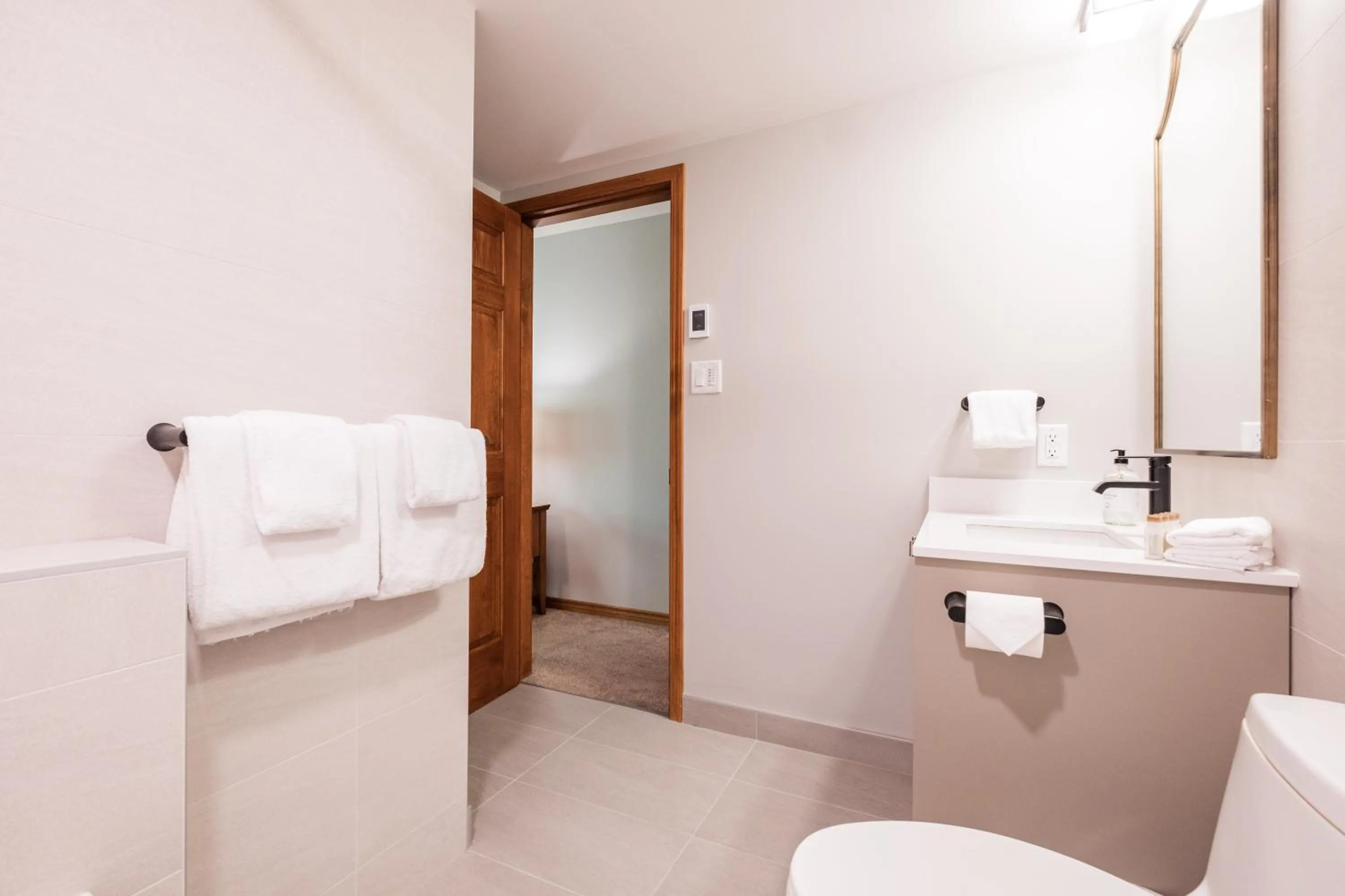 Toilet in Arrowhead Point by Outpost Whistler