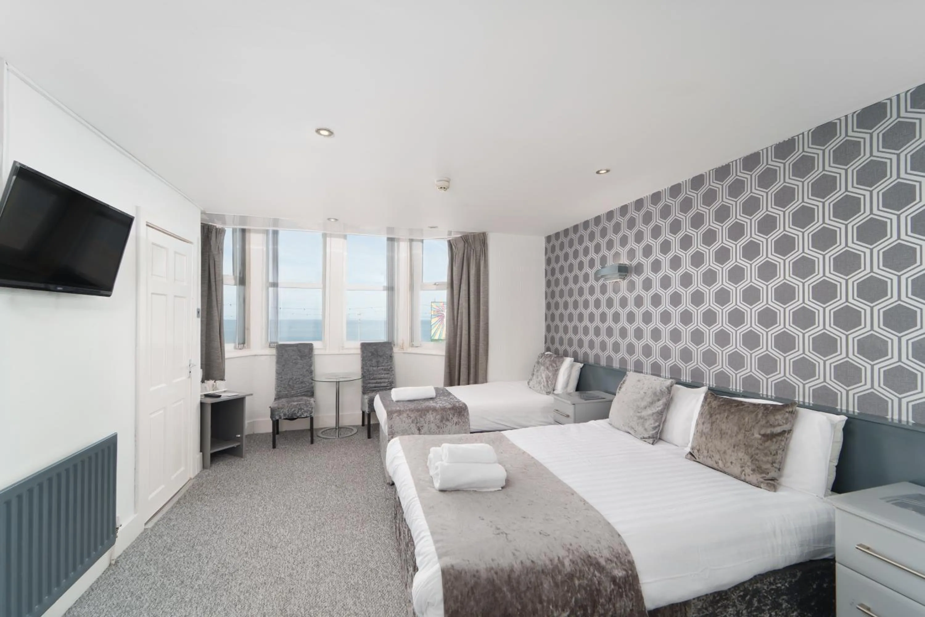 Bed in The Royal Boston Hotel by Compass Hospitality