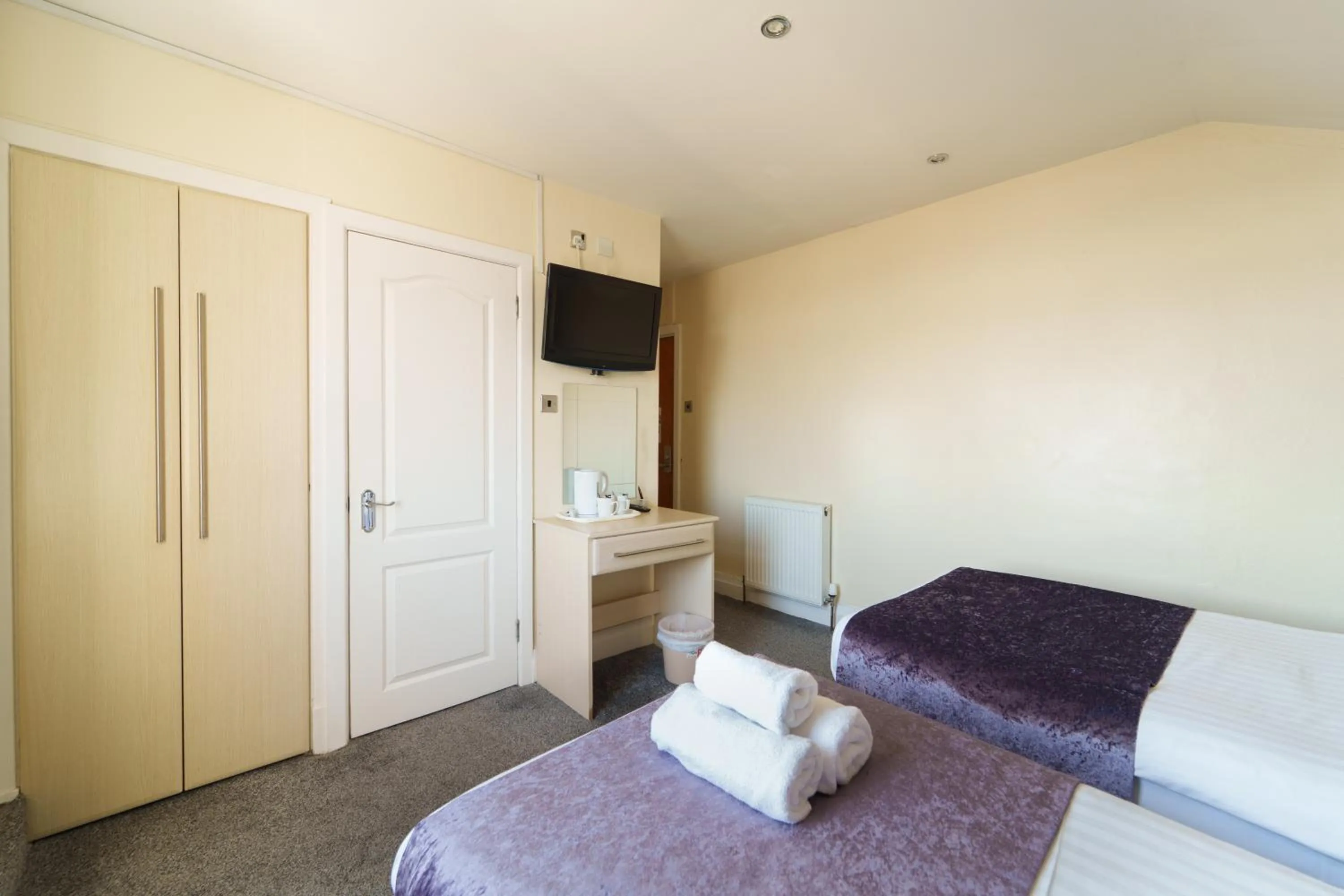 Bed in The Royal Boston Hotel by Compass Hospitality