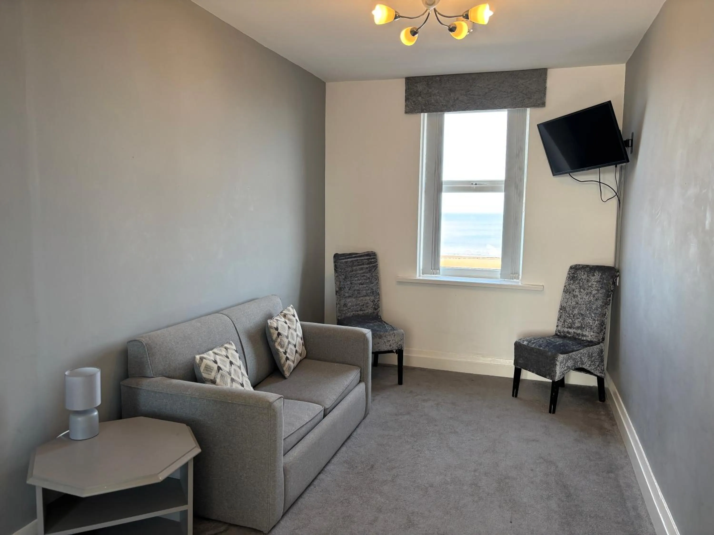 Bedroom in The Royal Boston Hotel by Compass Hospitality