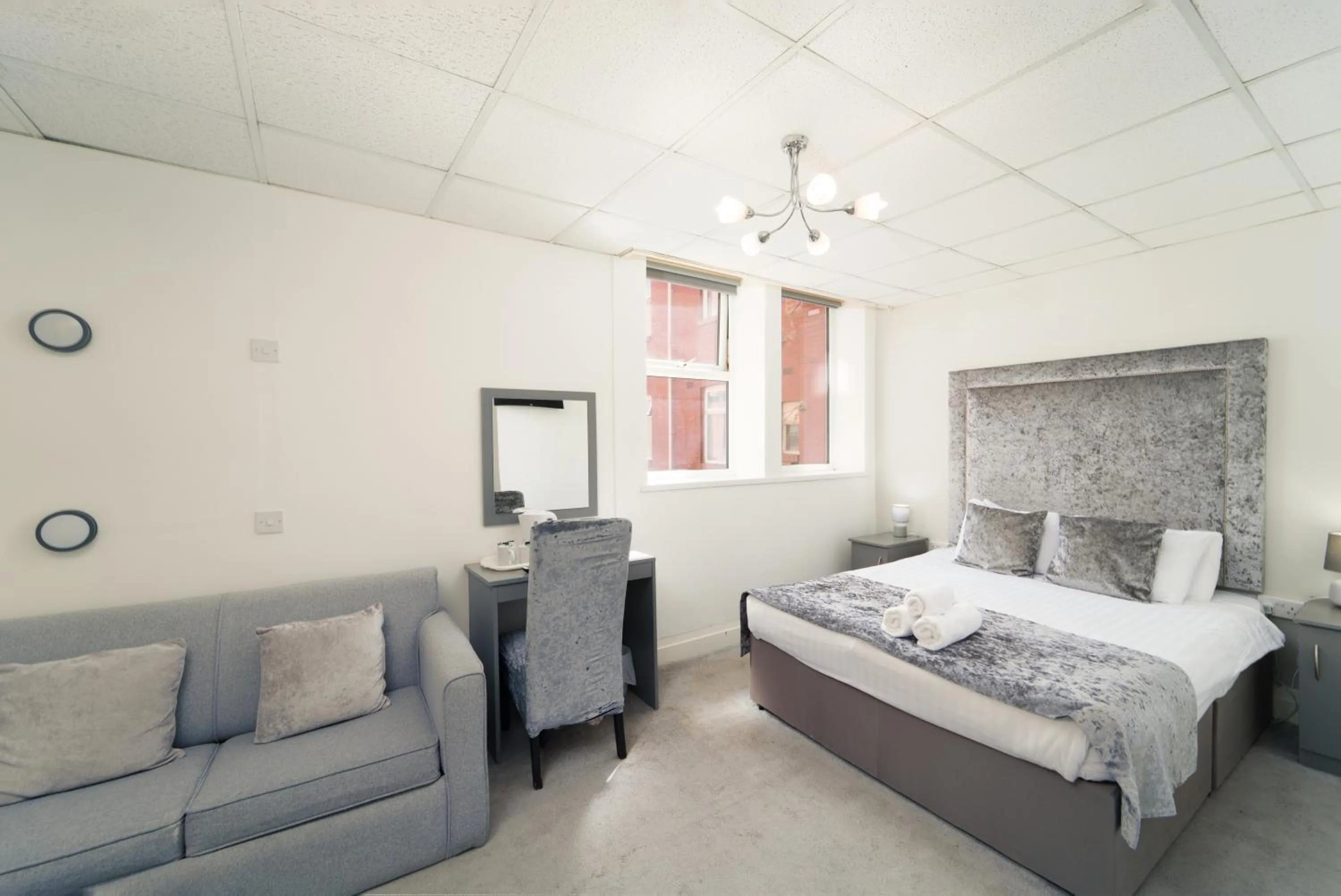 Bed in The Royal Boston Hotel by Compass Hospitality