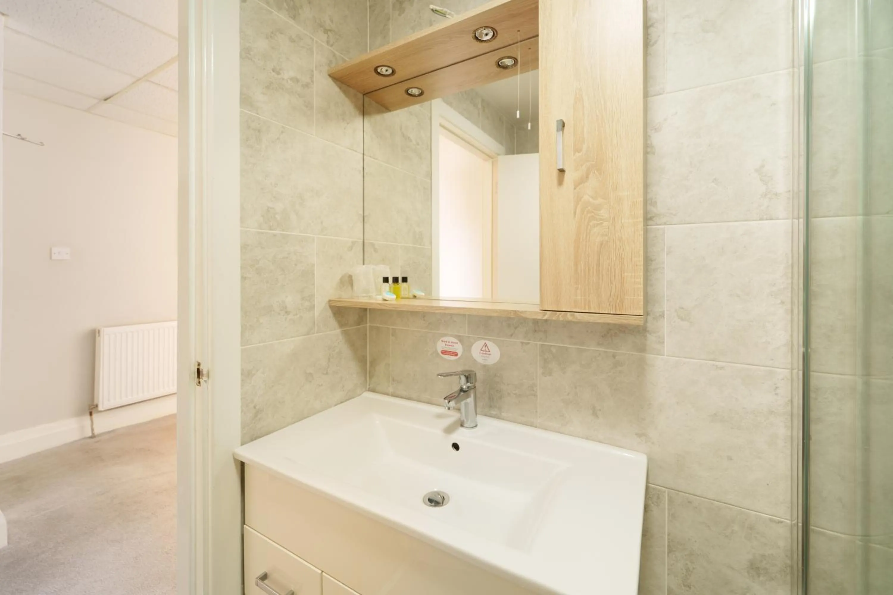 Bathroom in The Royal Boston Hotel by Compass Hospitality