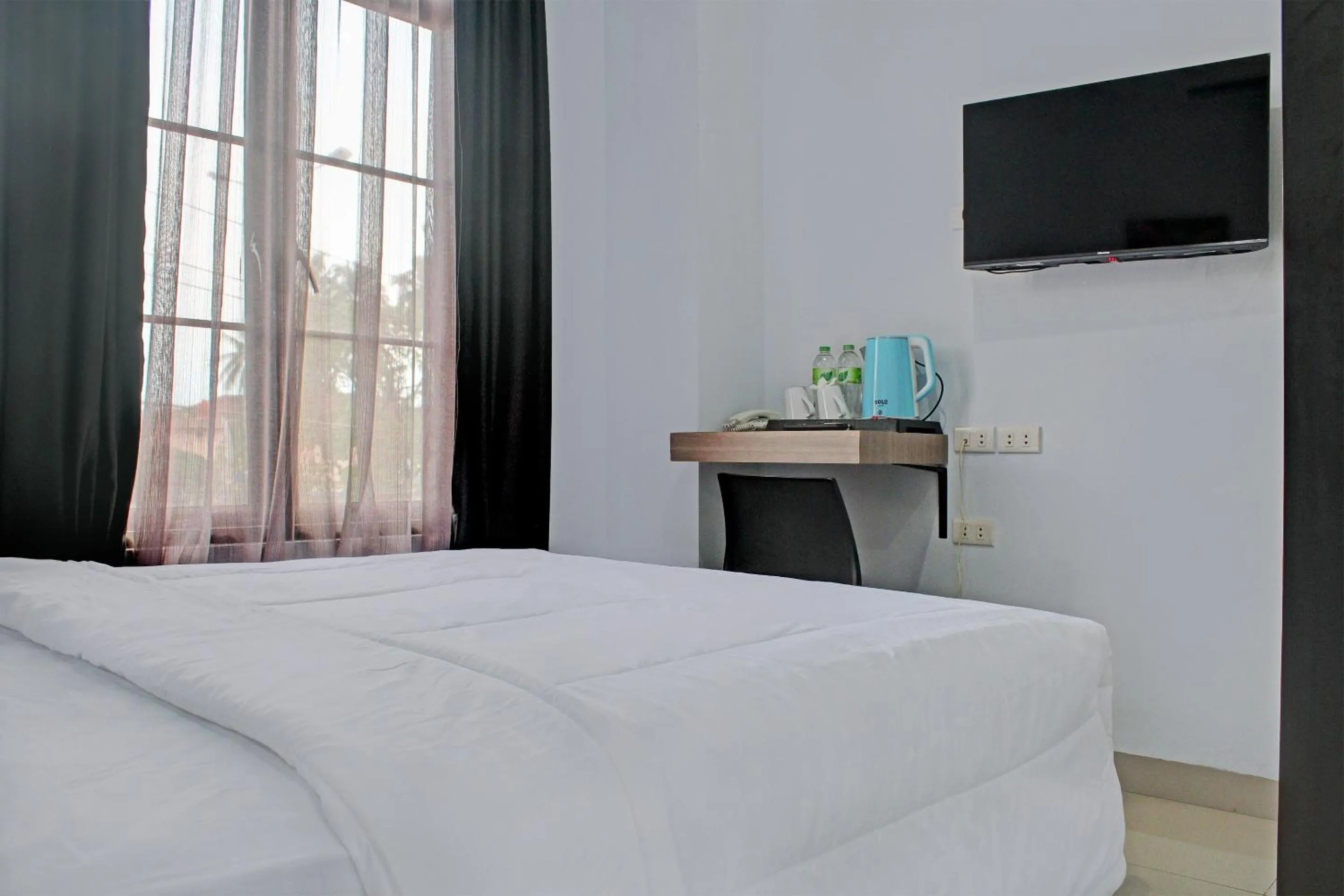 Bedroom in Capital O 92583 Raja Soeta Hostel Syariah