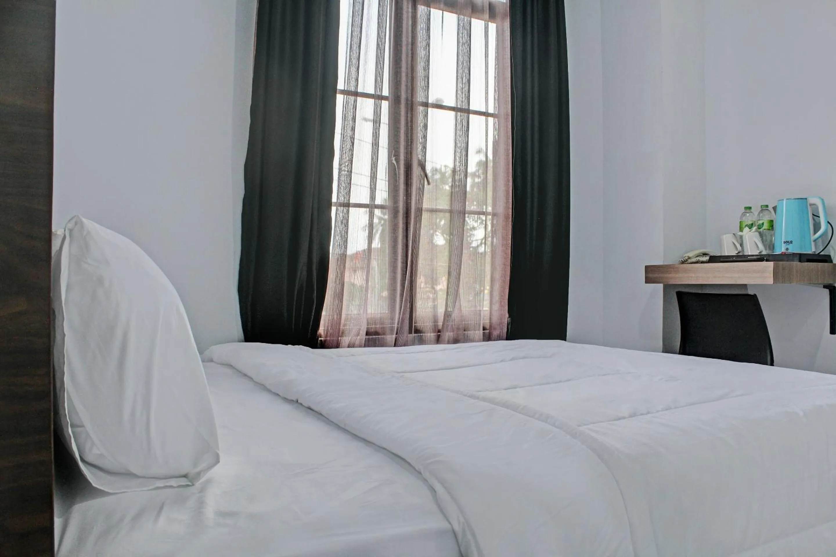 Bedroom in Capital O 92583 Raja Soeta Hostel Syariah