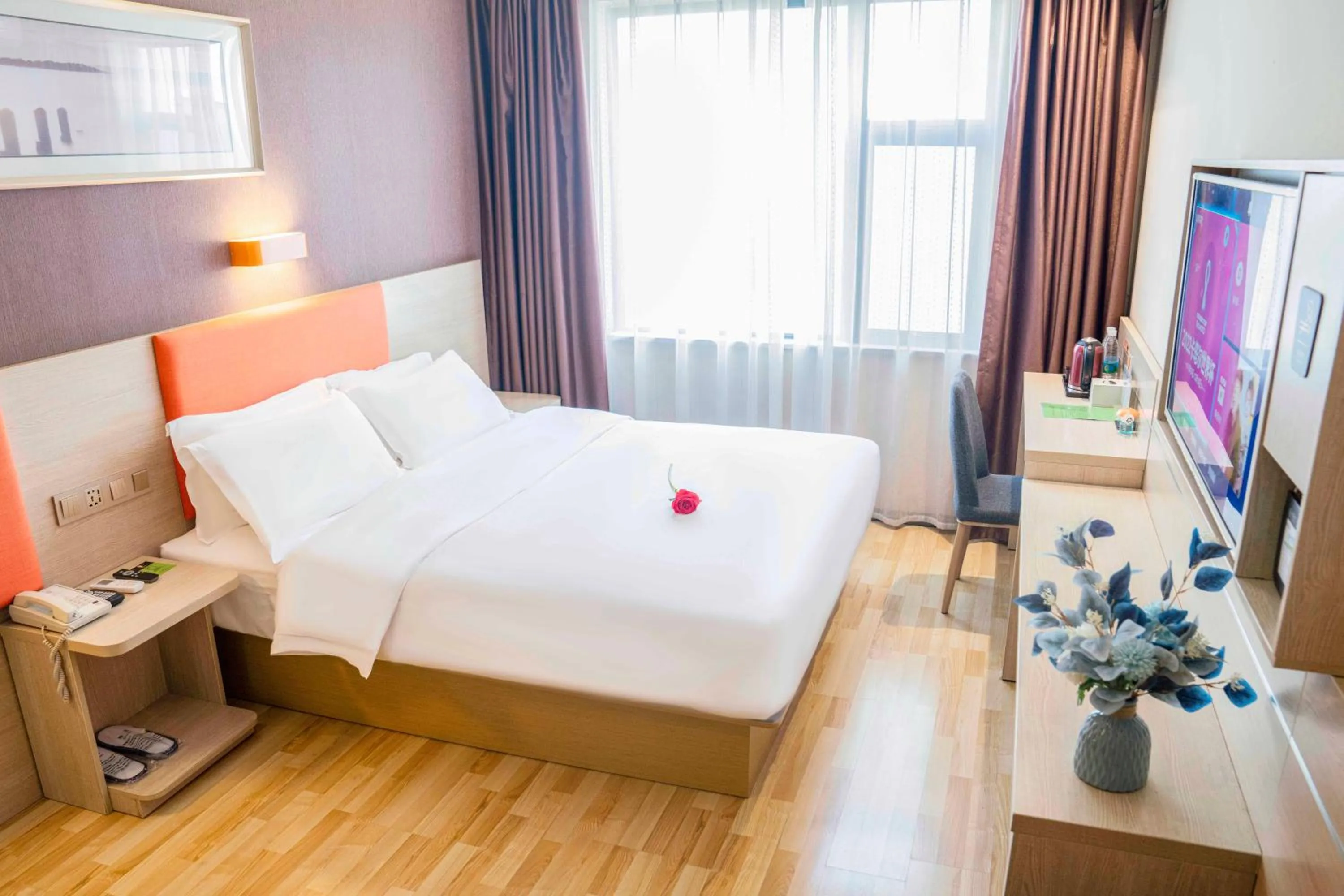 Photo of the whole room in 7 Days Premium - Kunming South High Speed Railway Station University Town Metro Station