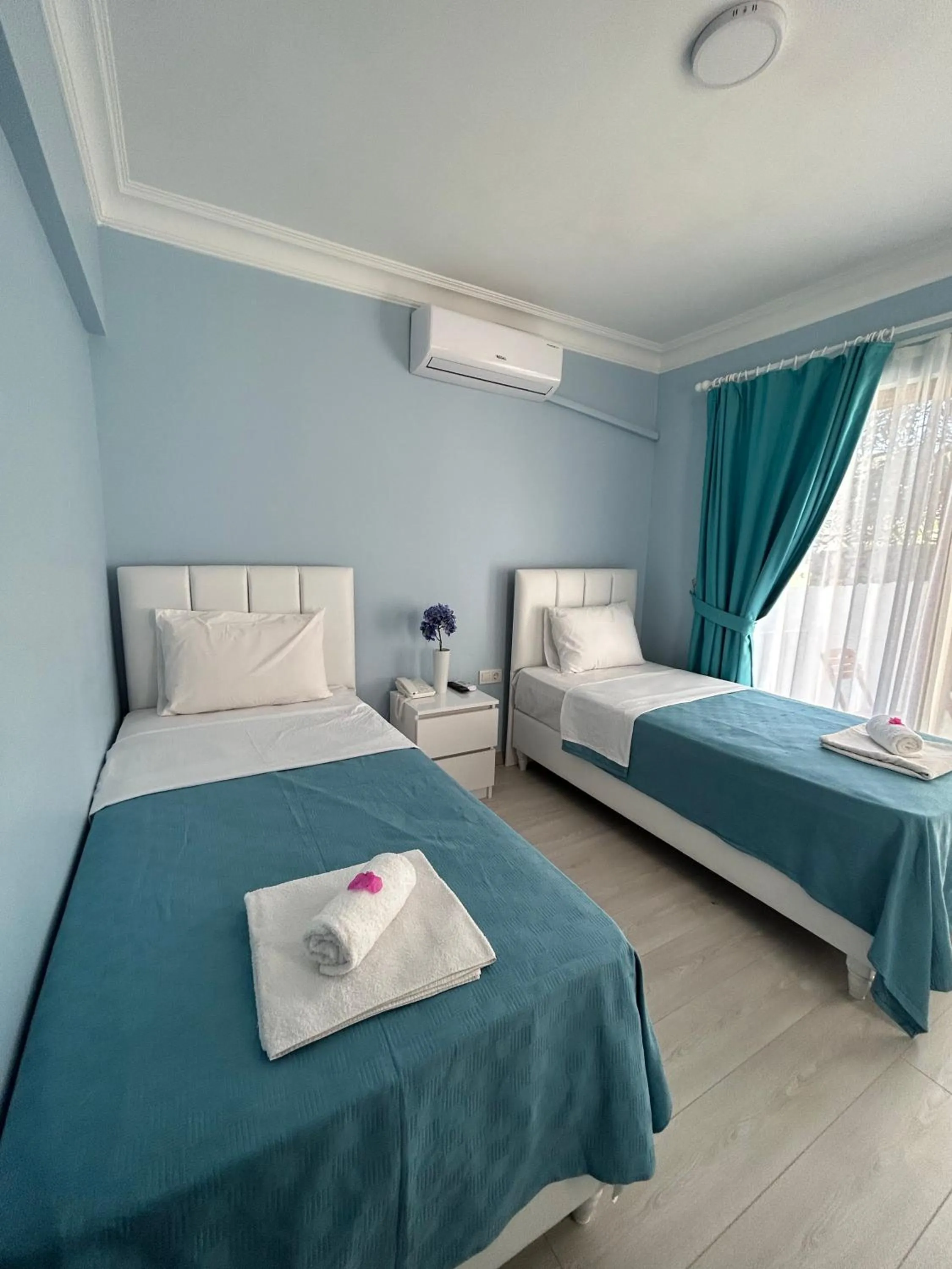 Bed in Marquis Blue Hotel