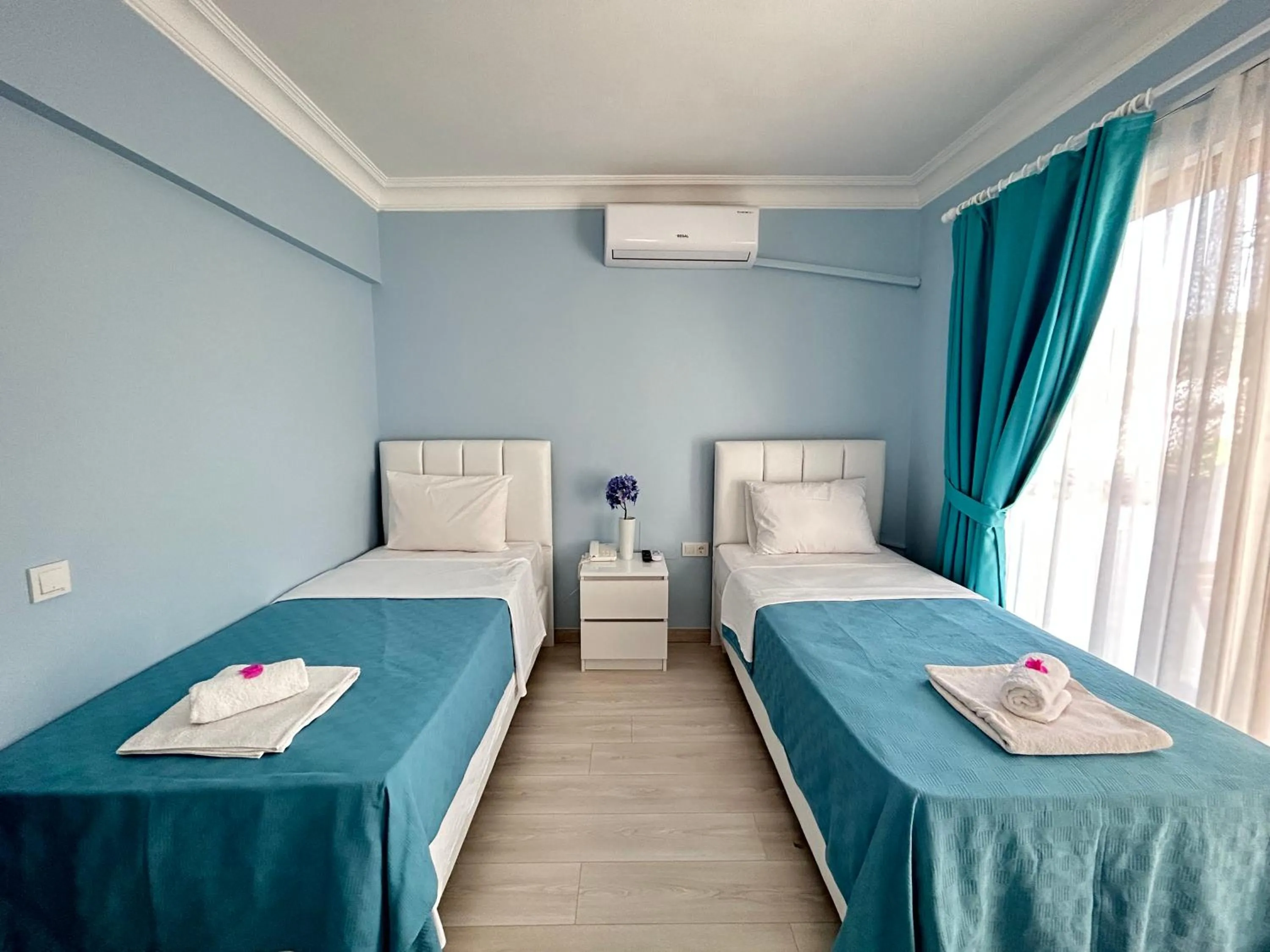 Bed in Marquis Blue Hotel