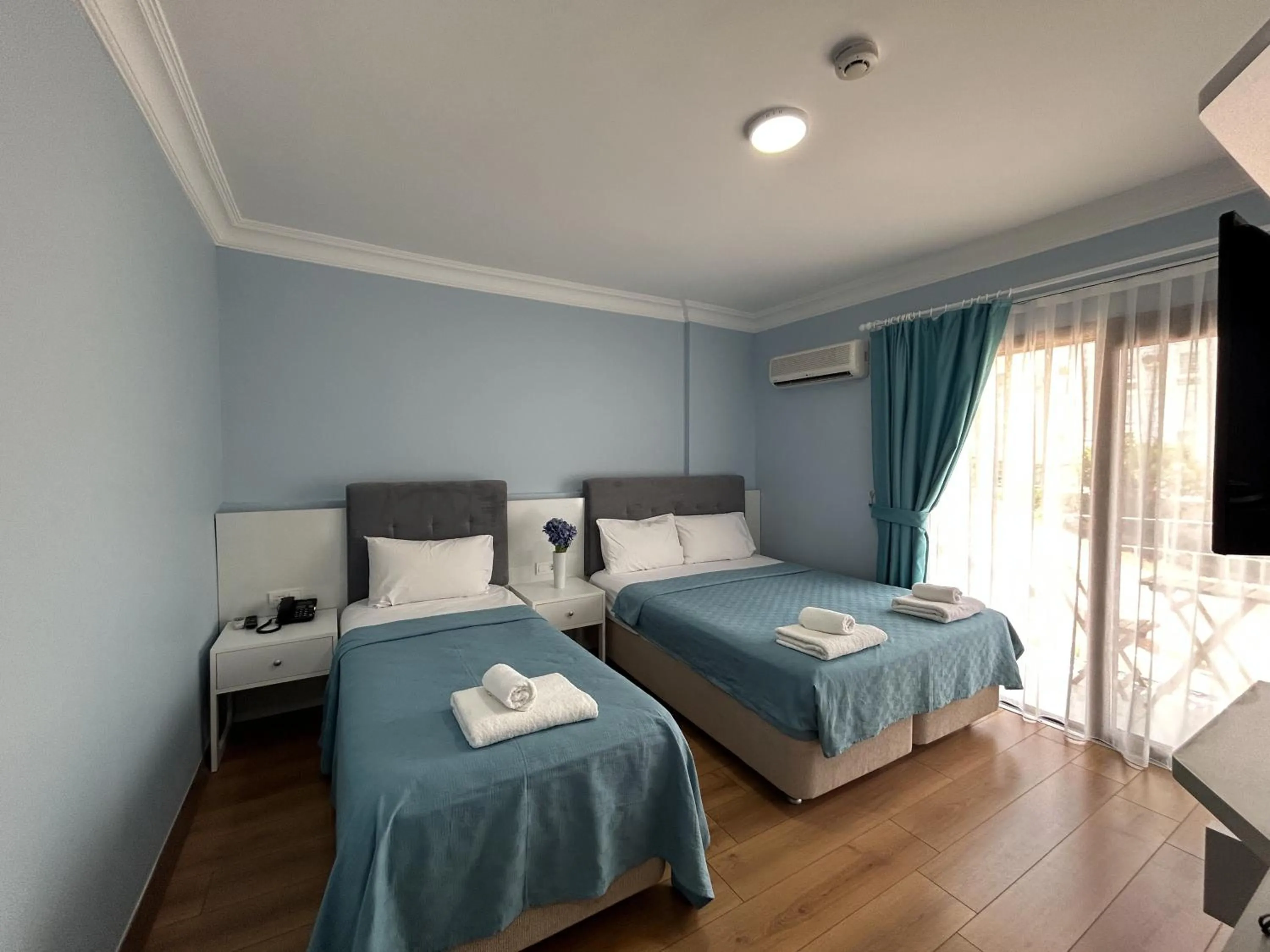 Bed in Marquis Blue Hotel