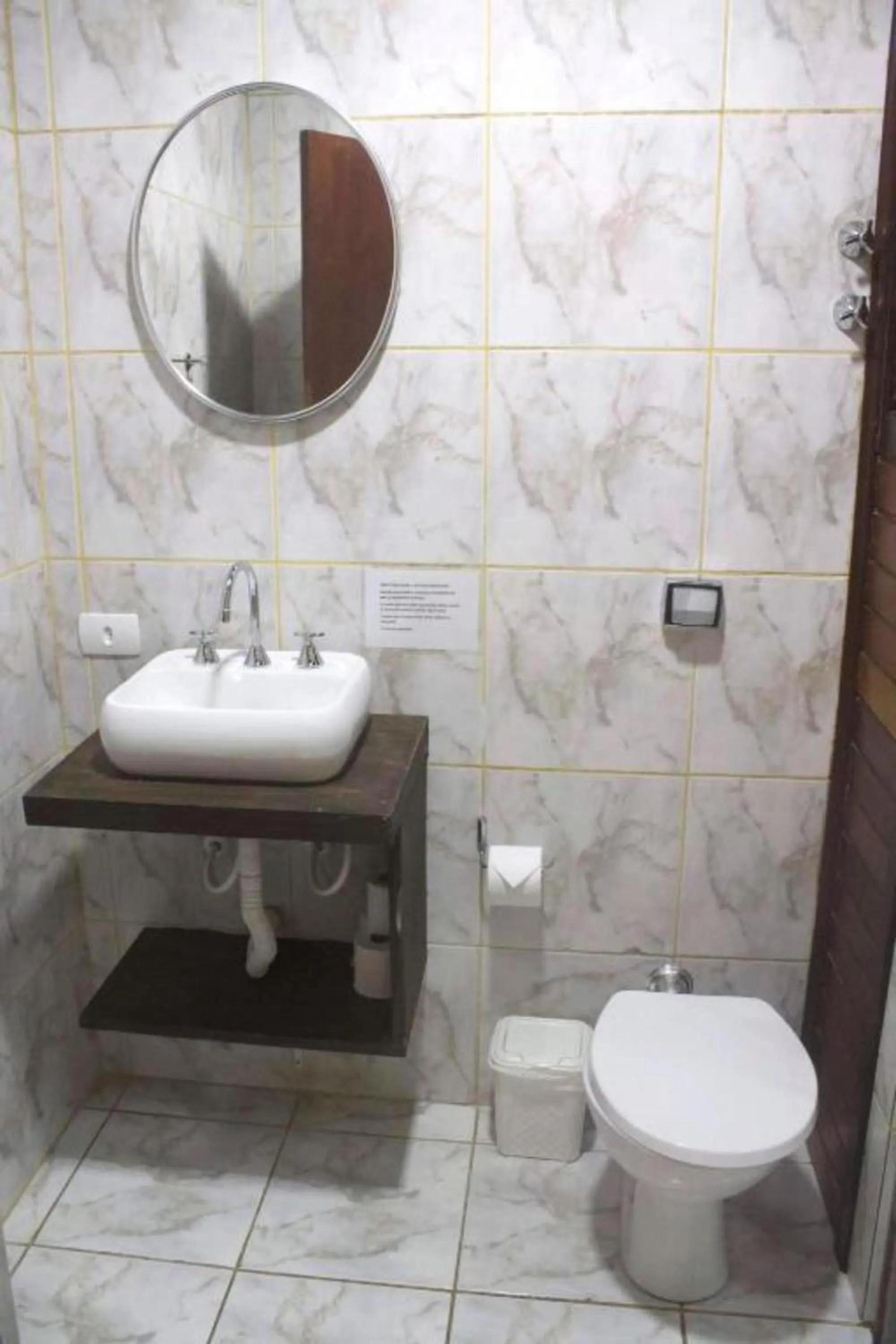 Toilet in Flamboyant Hotel