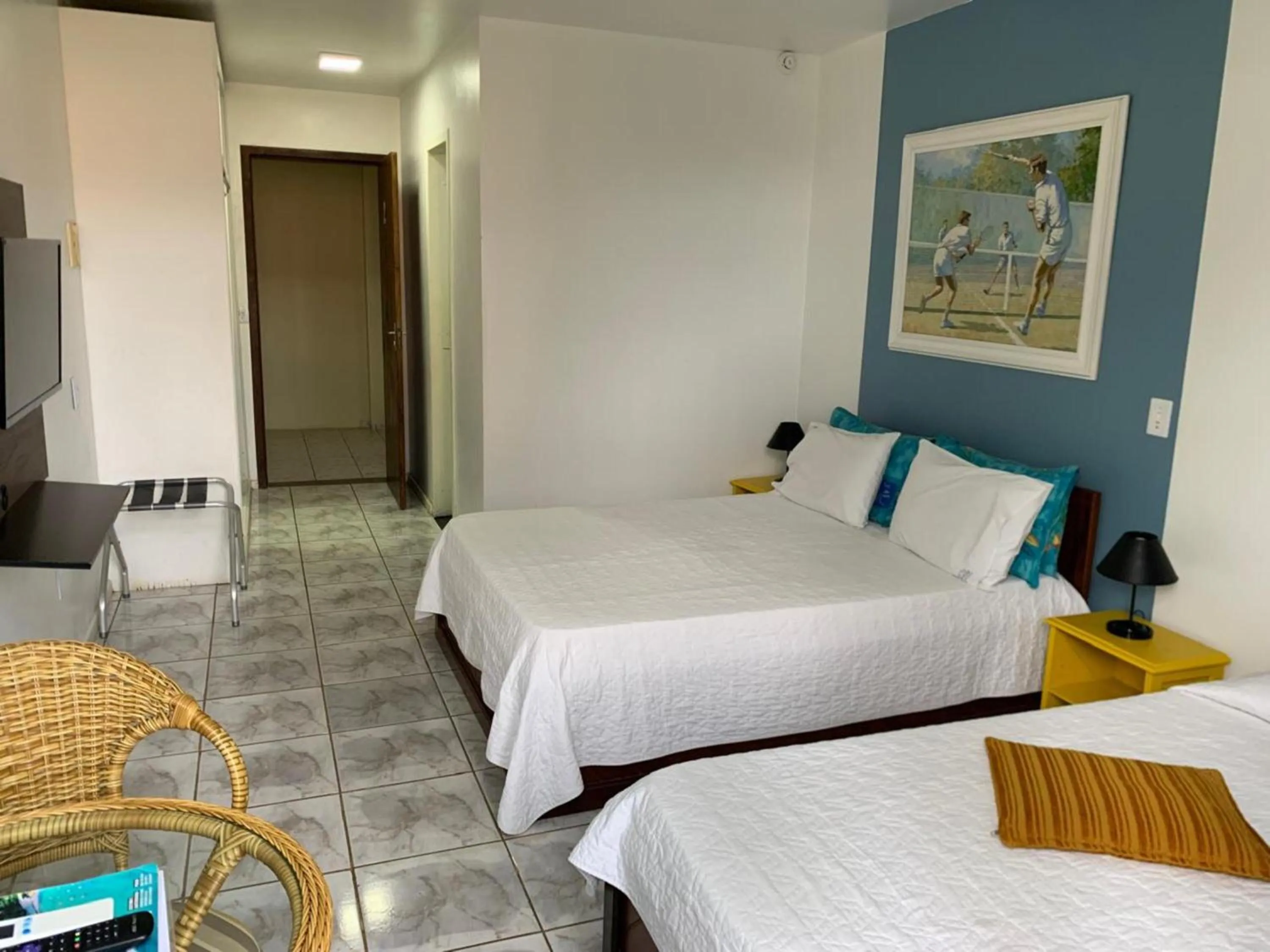 Bed in Flamboyant Hotel