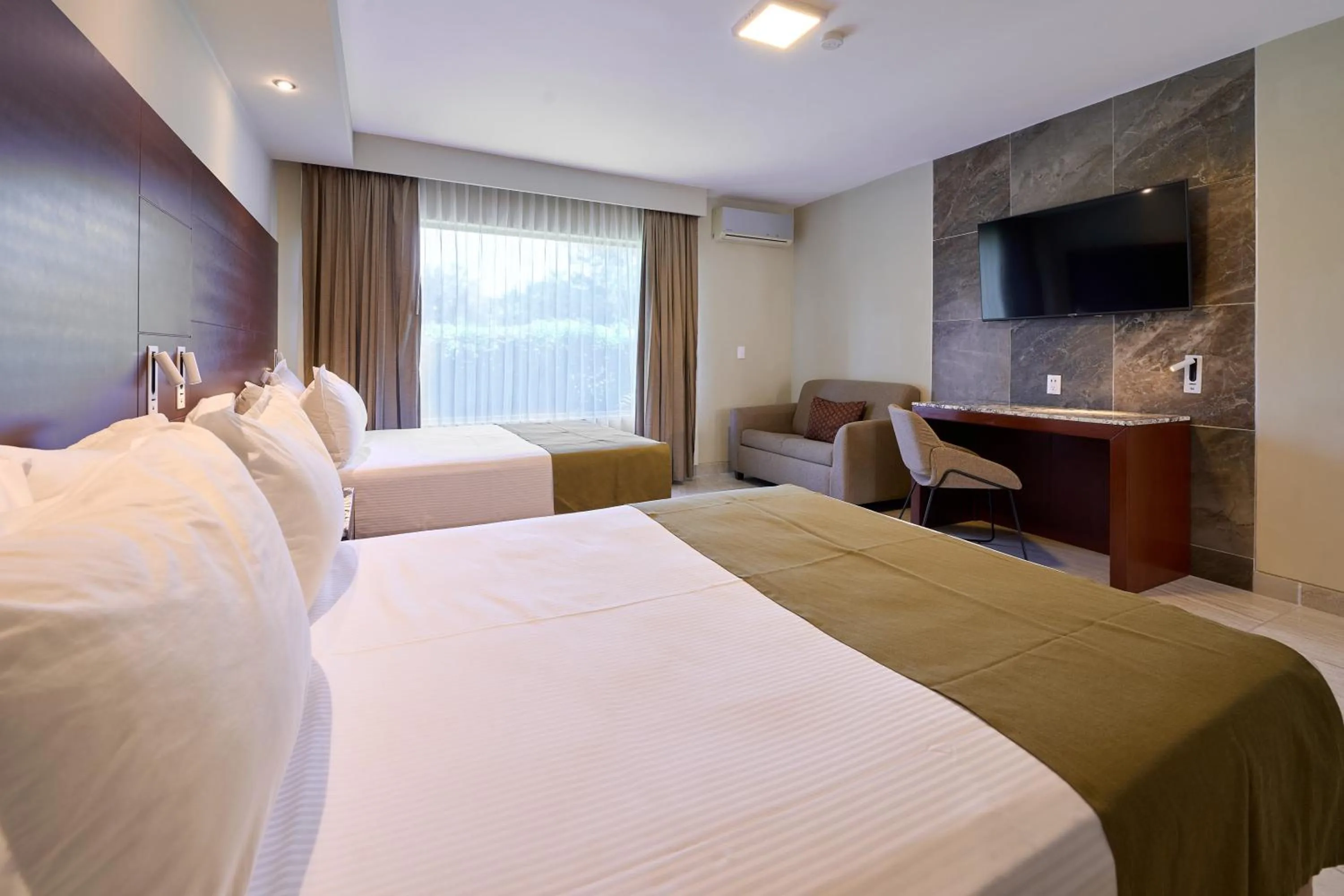 Bedroom, Bed in Hotel Estancia Business Class