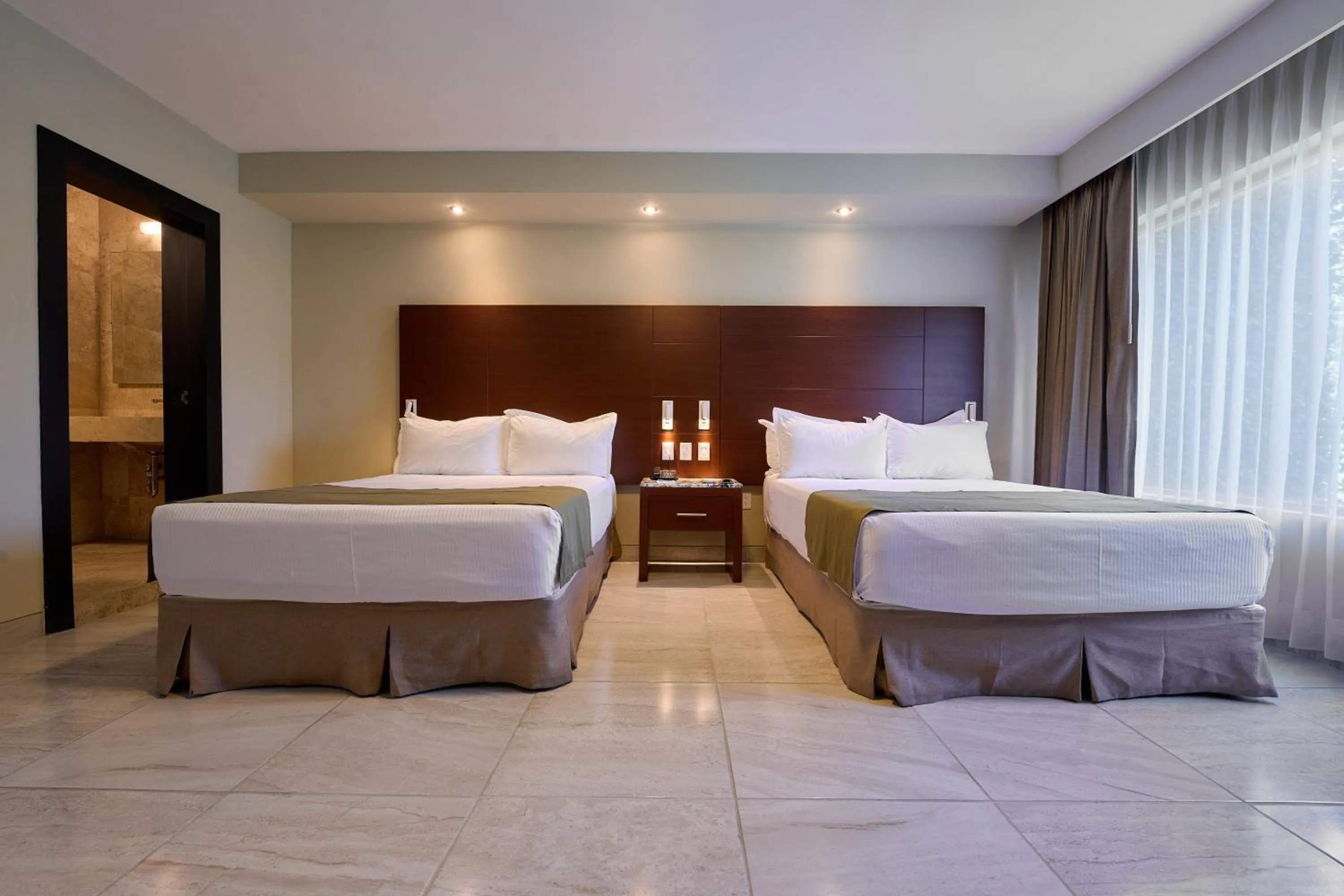 Bedroom, Bed in Hotel Estancia Business Class