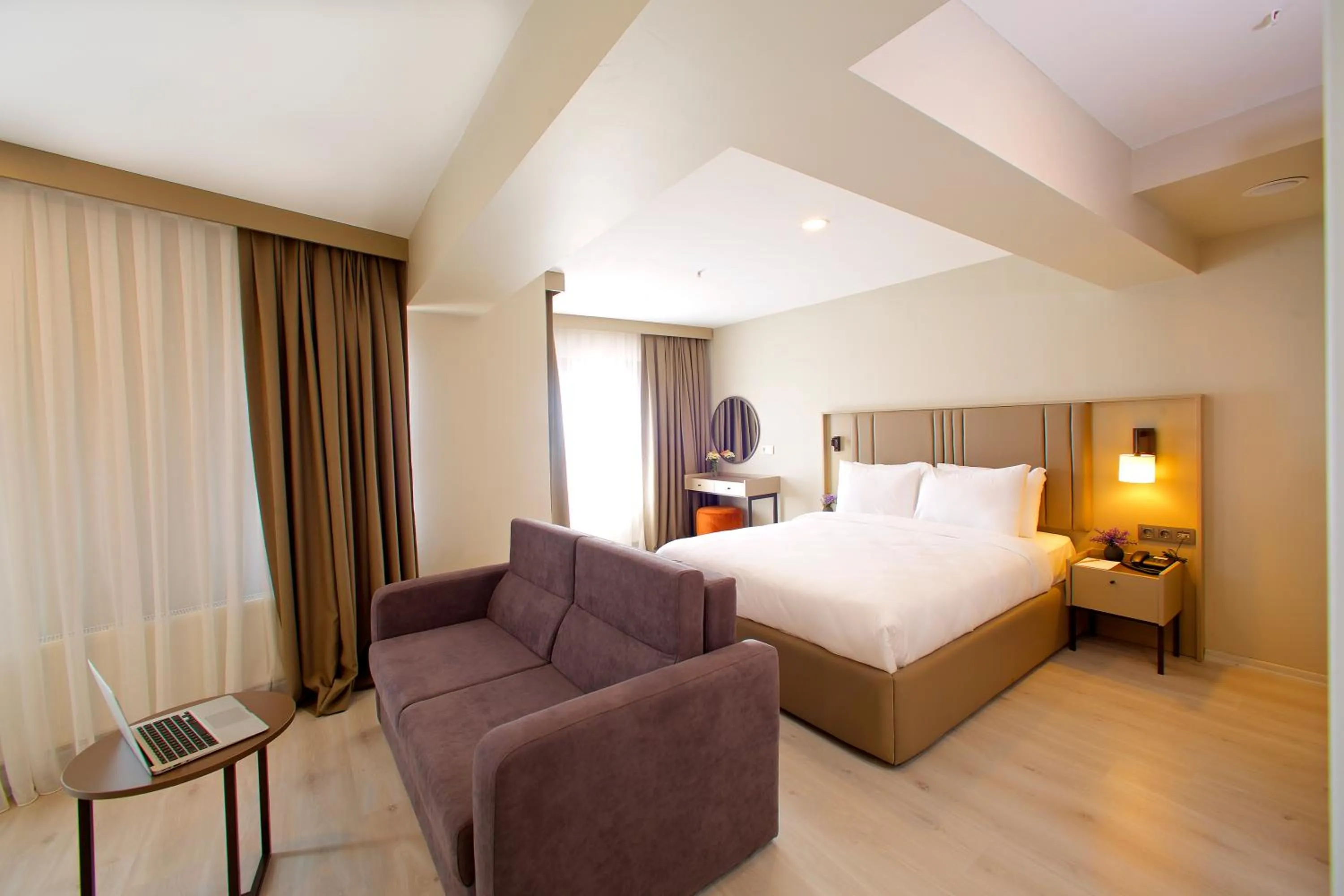 Seating area, Bed in Joy Taksim