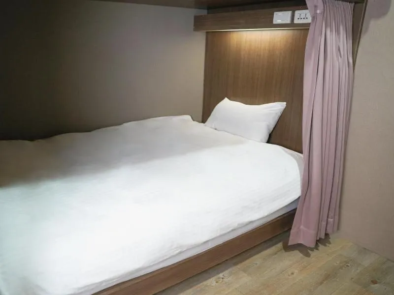 Bed in Dan Lee Inn