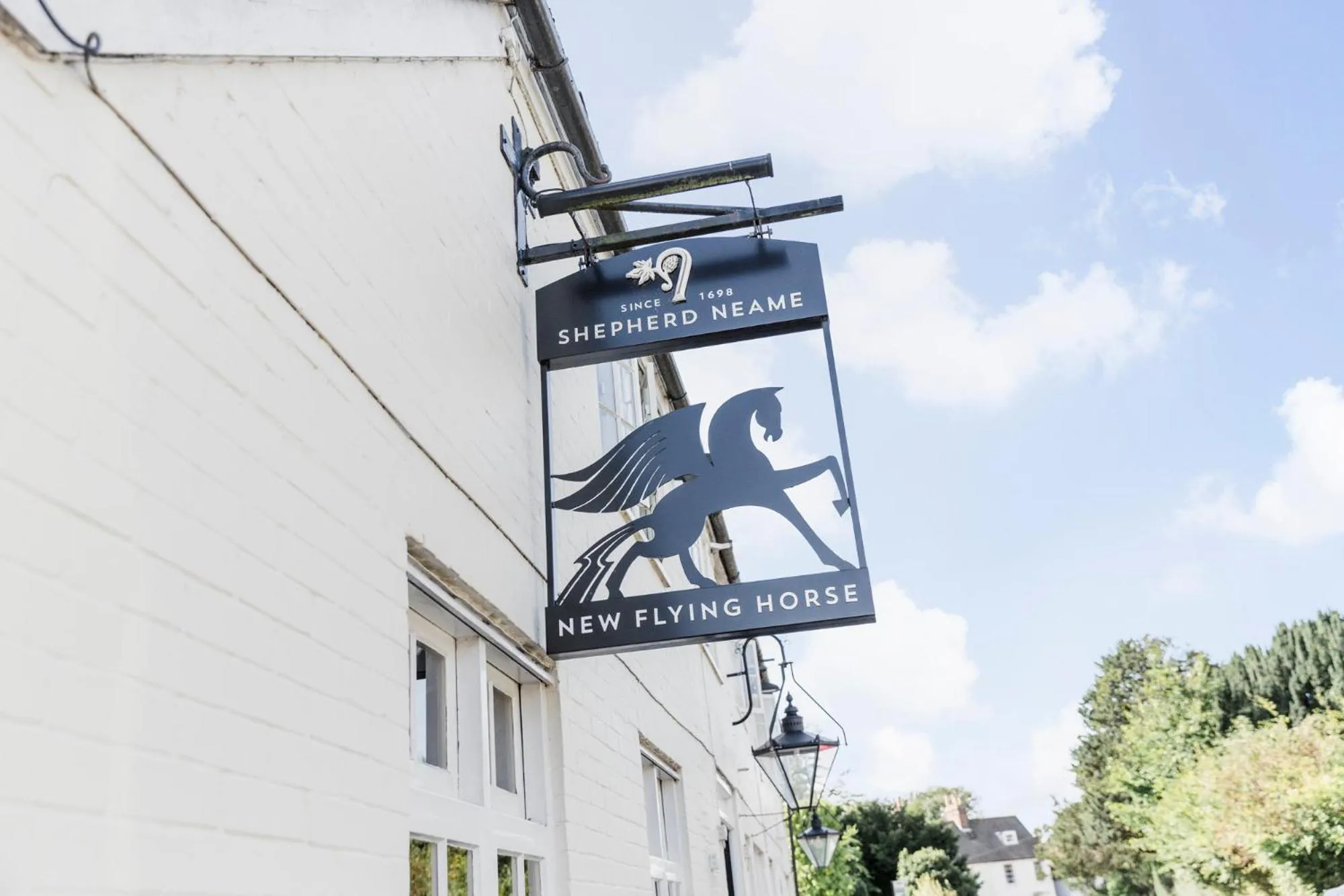 Property logo or sign in New Flying Horse Inn