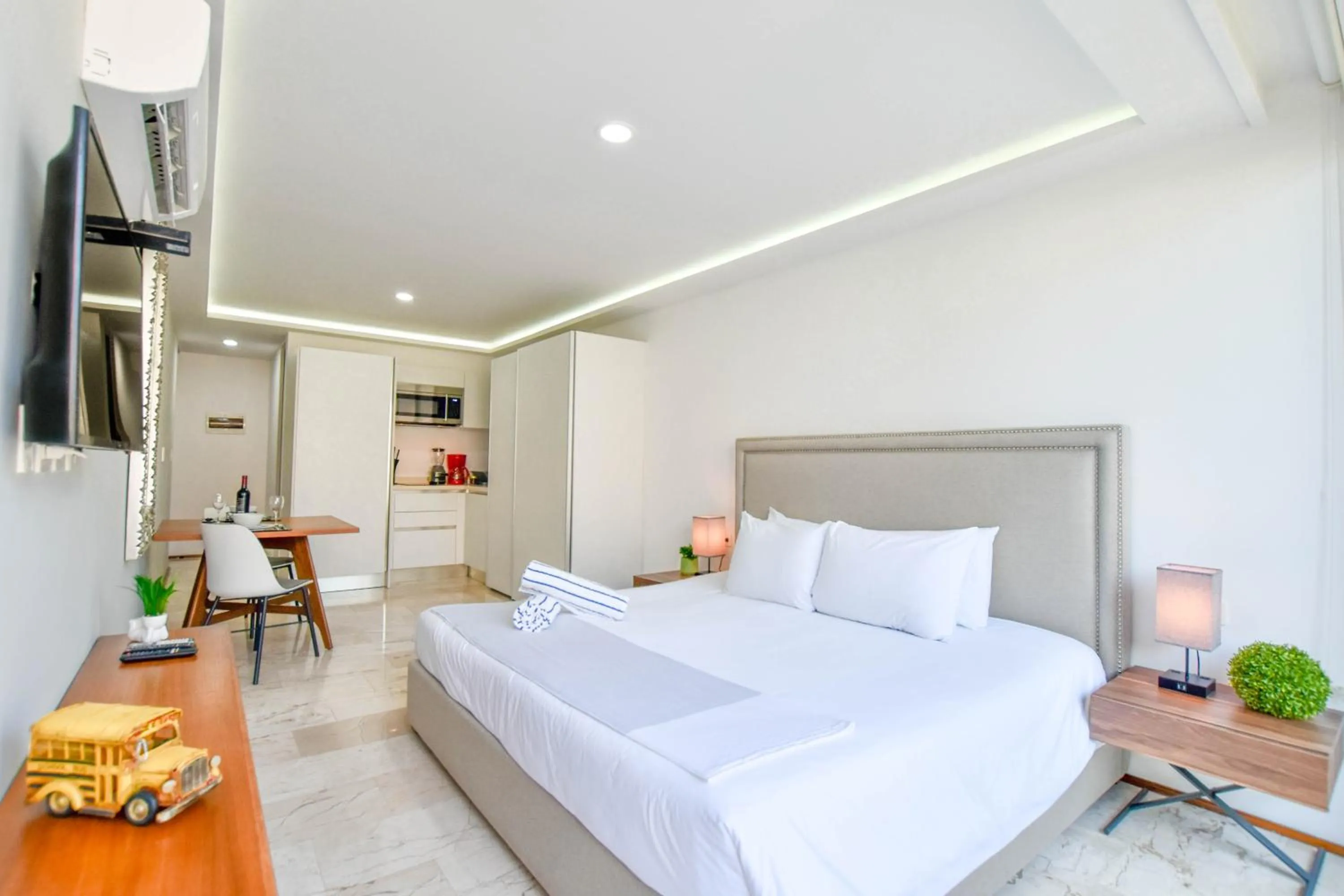 Bedroom, Bed in OP downtown Studio by Casago