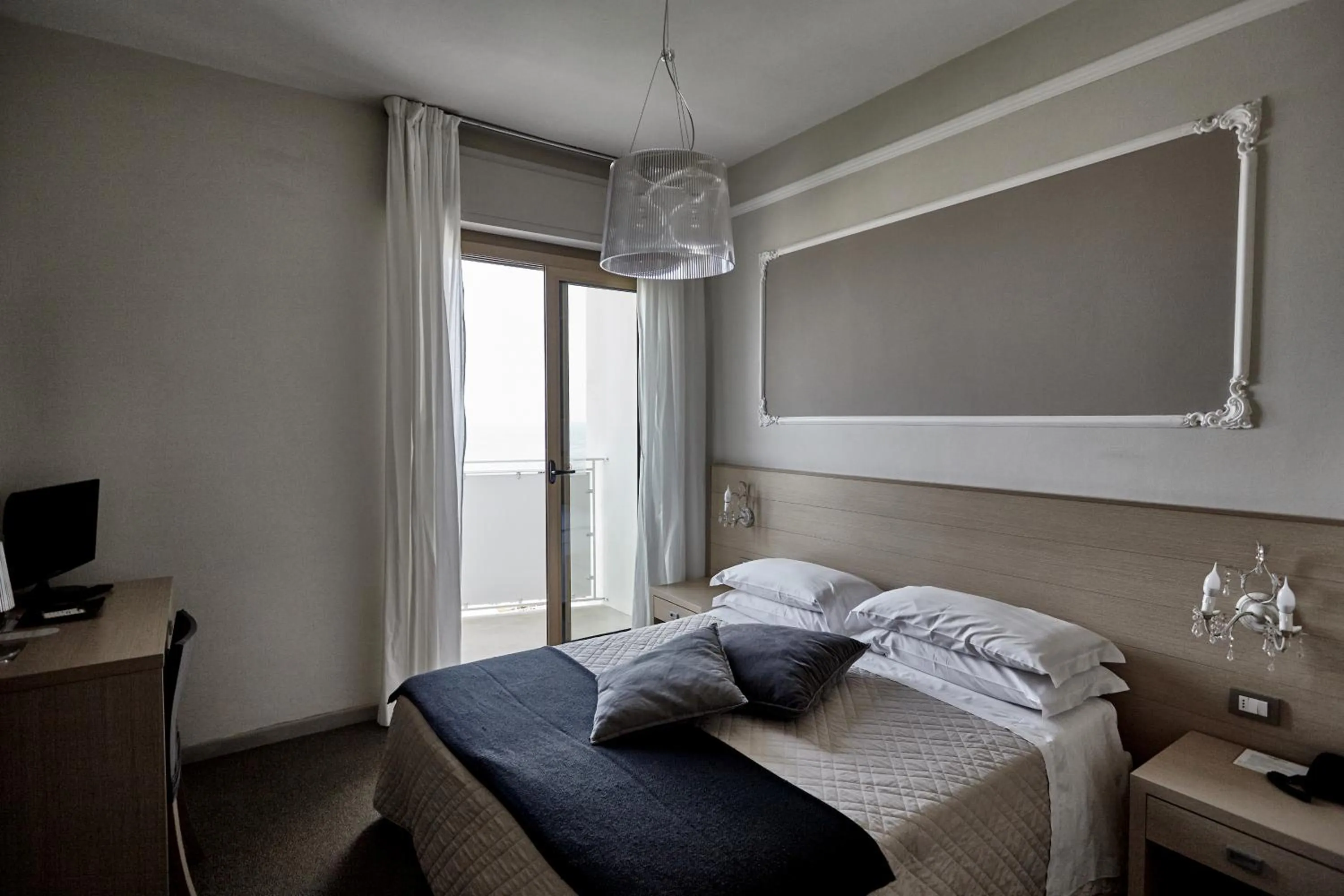 Bed in Rouge Hotel International