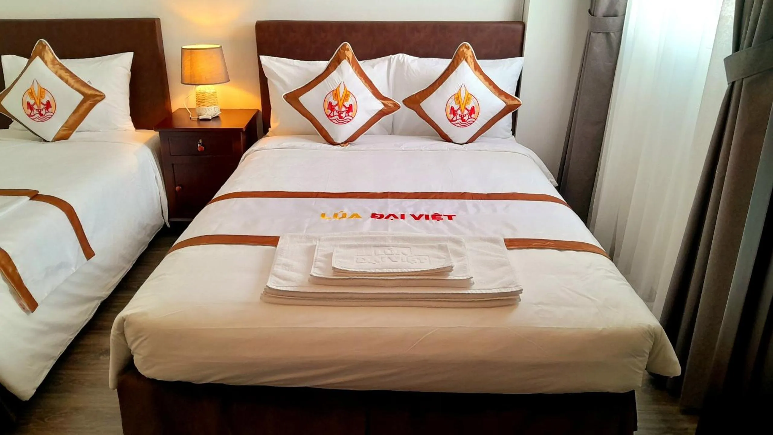 Bed in THE RICE HOTEL