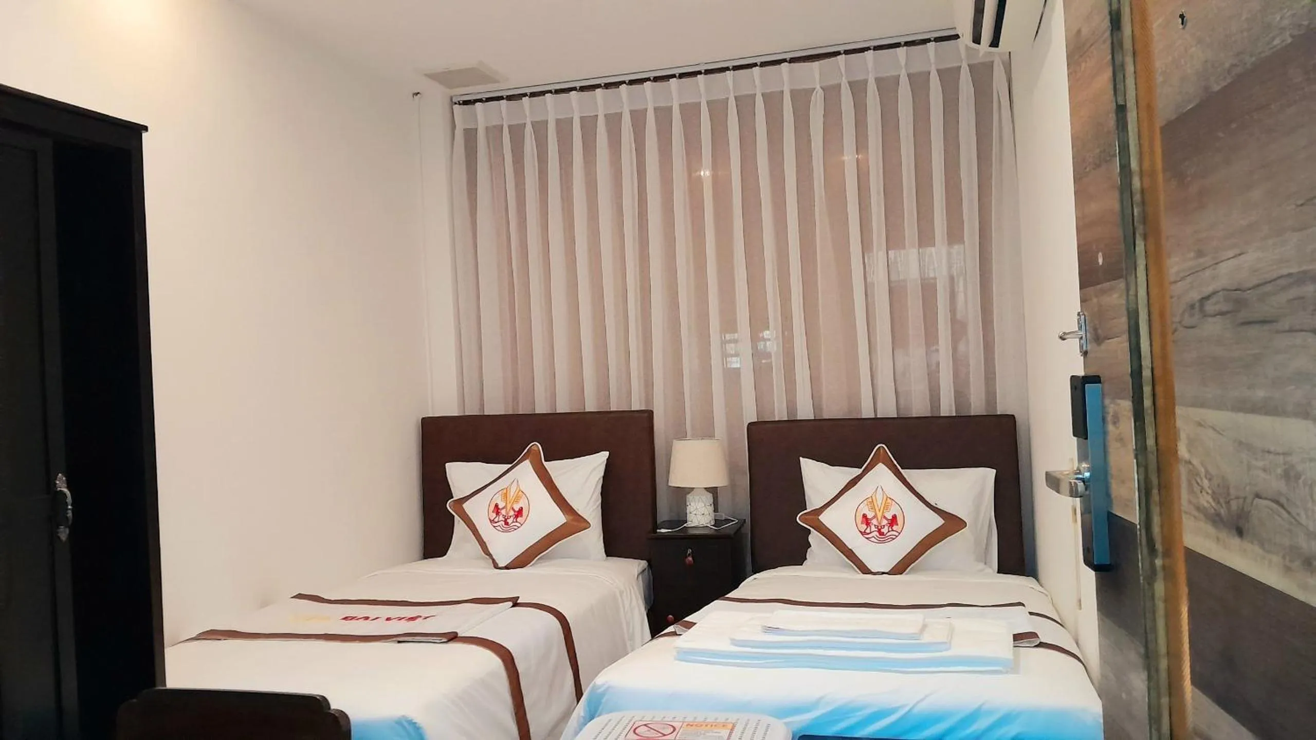 Bed in THE RICE HOTEL