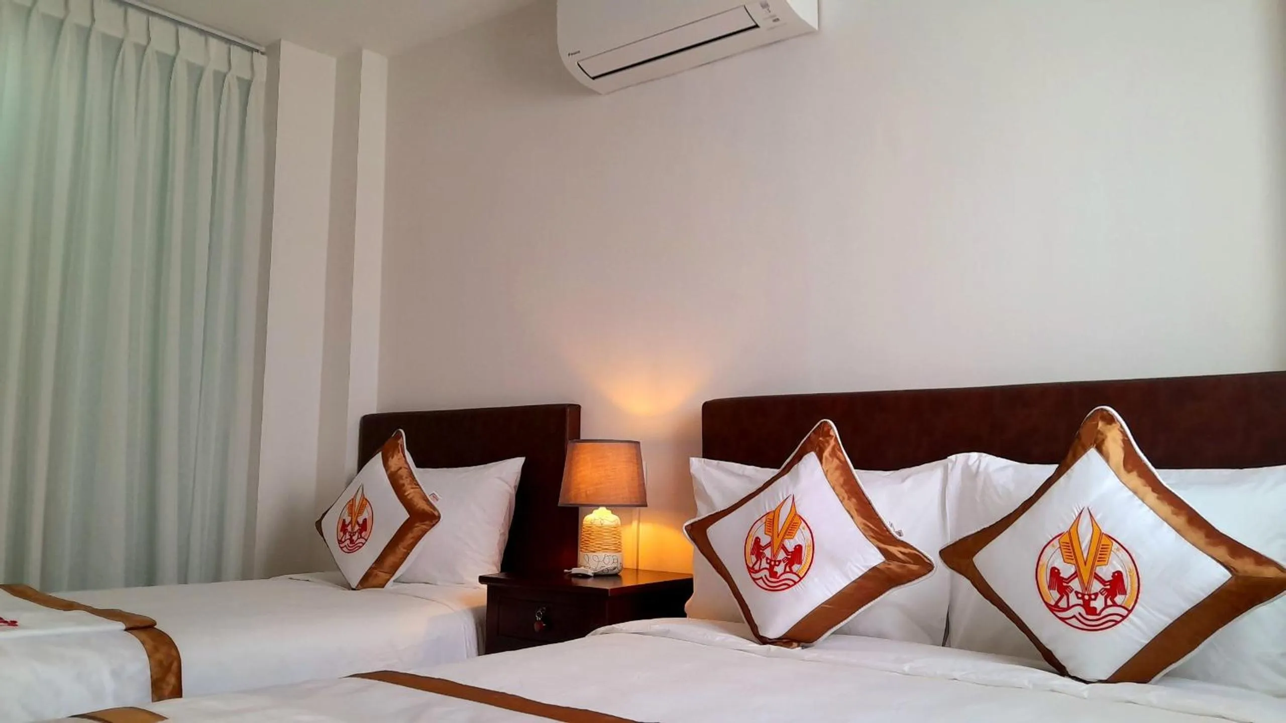 Bed in THE RICE HOTEL