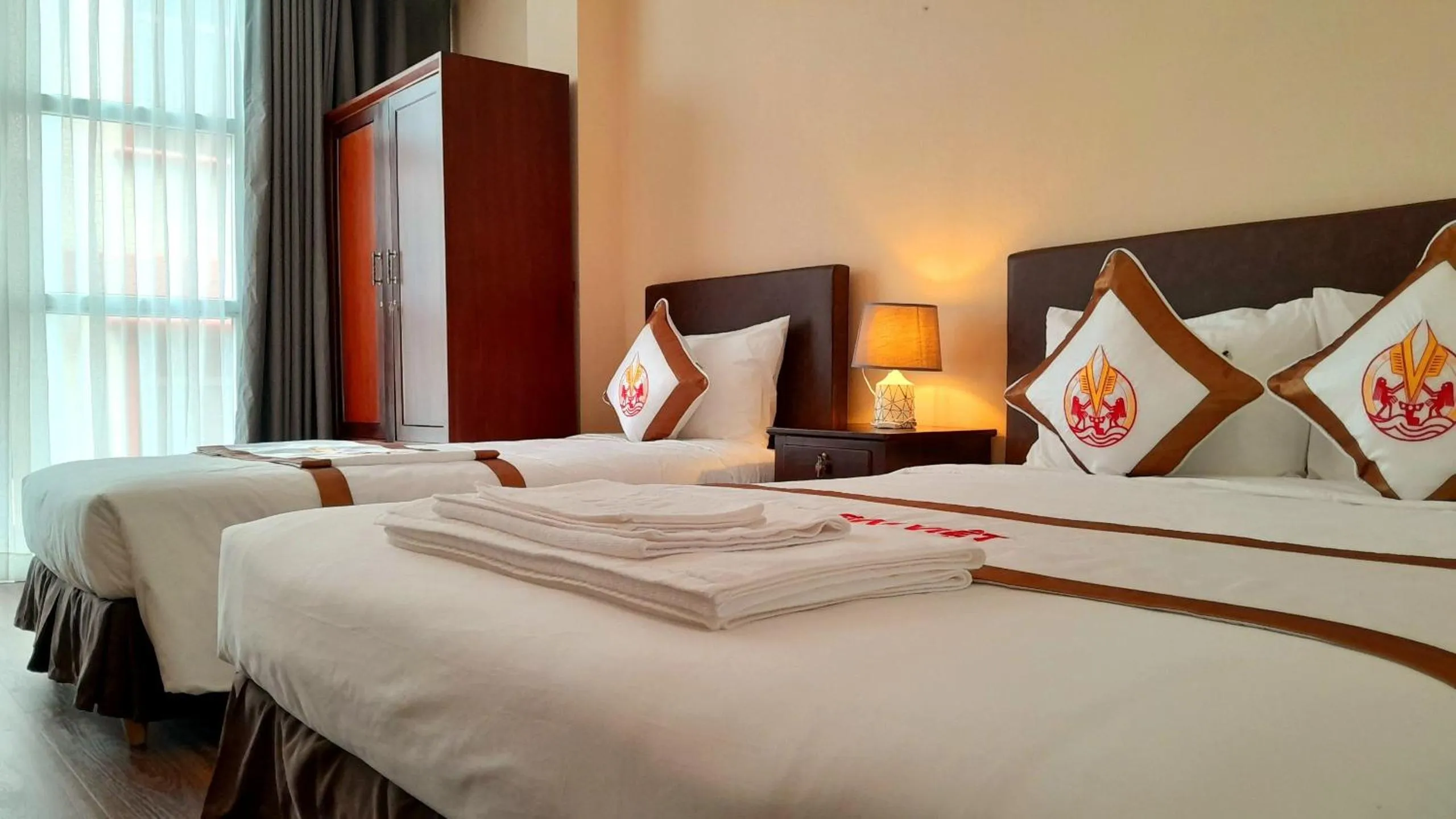 Bed in THE RICE HOTEL