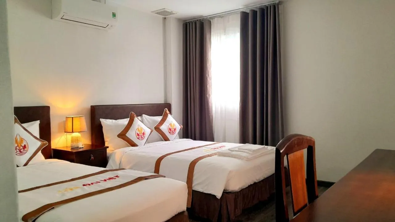 Bed in THE RICE HOTEL