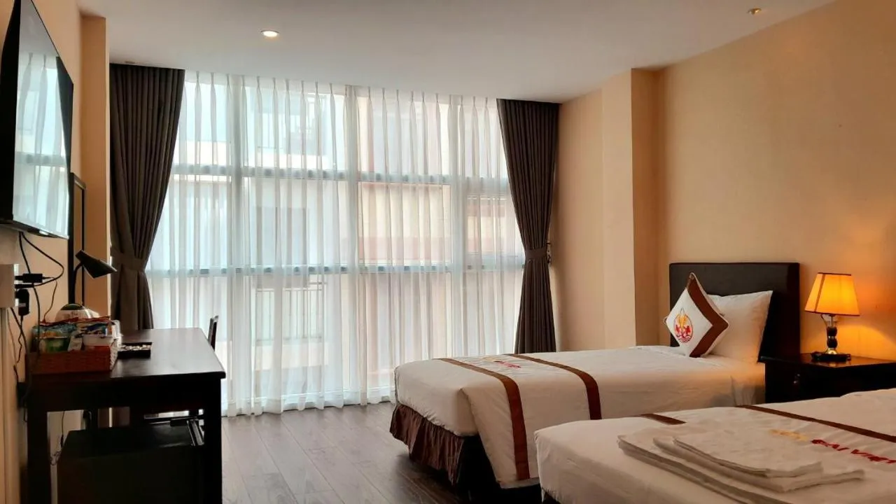 Bed in THE RICE HOTEL