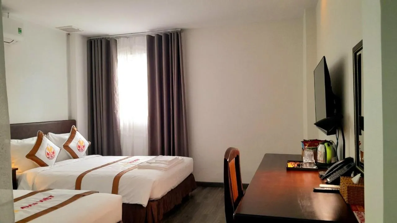 Bed in THE RICE HOTEL